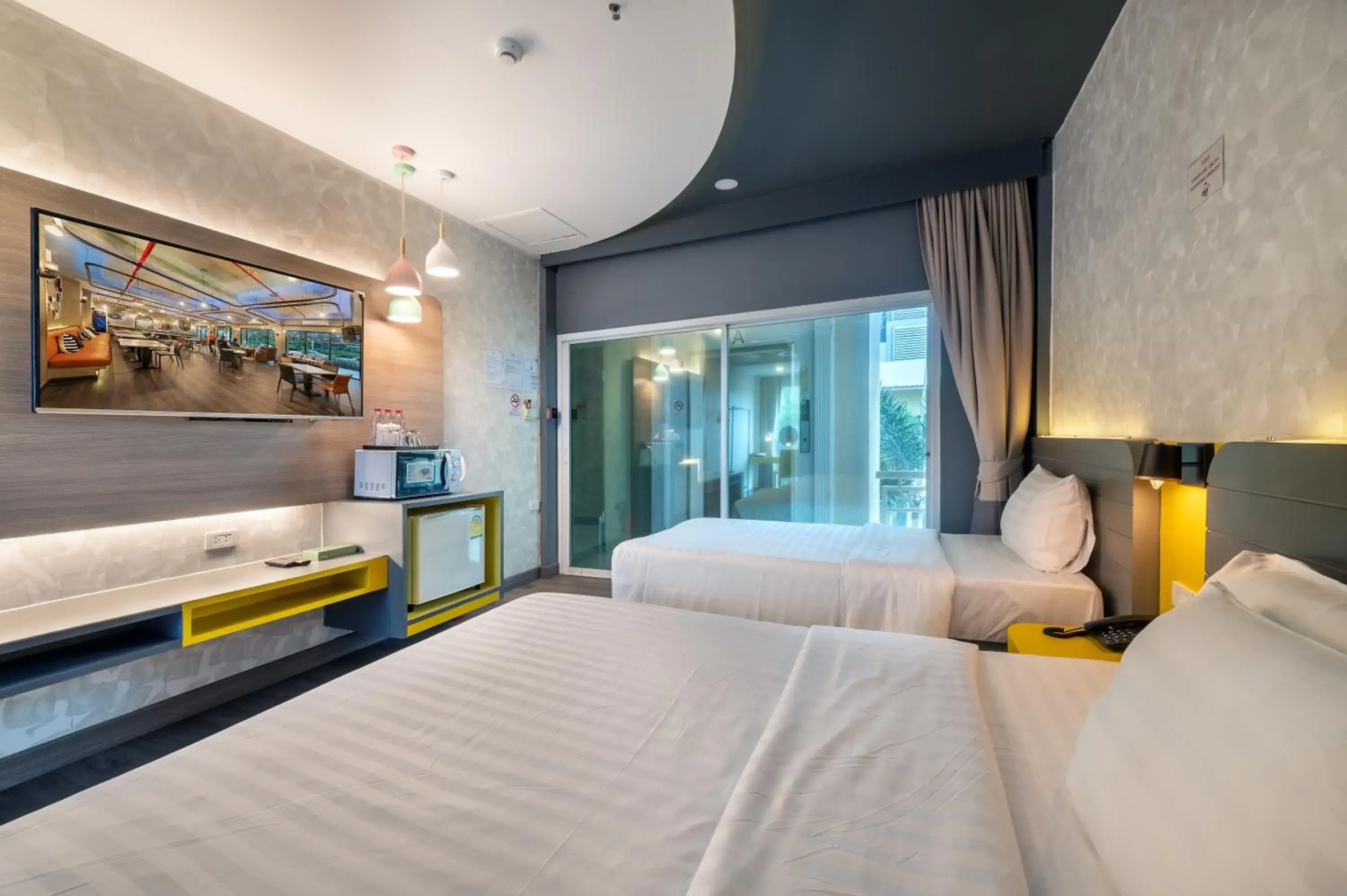 Deluxe Triple Room in Qiu Hotel Sukhumvit SHA Plus Deluxe Triple Room in Qiu Hotel Sukhumvit SHA Plus