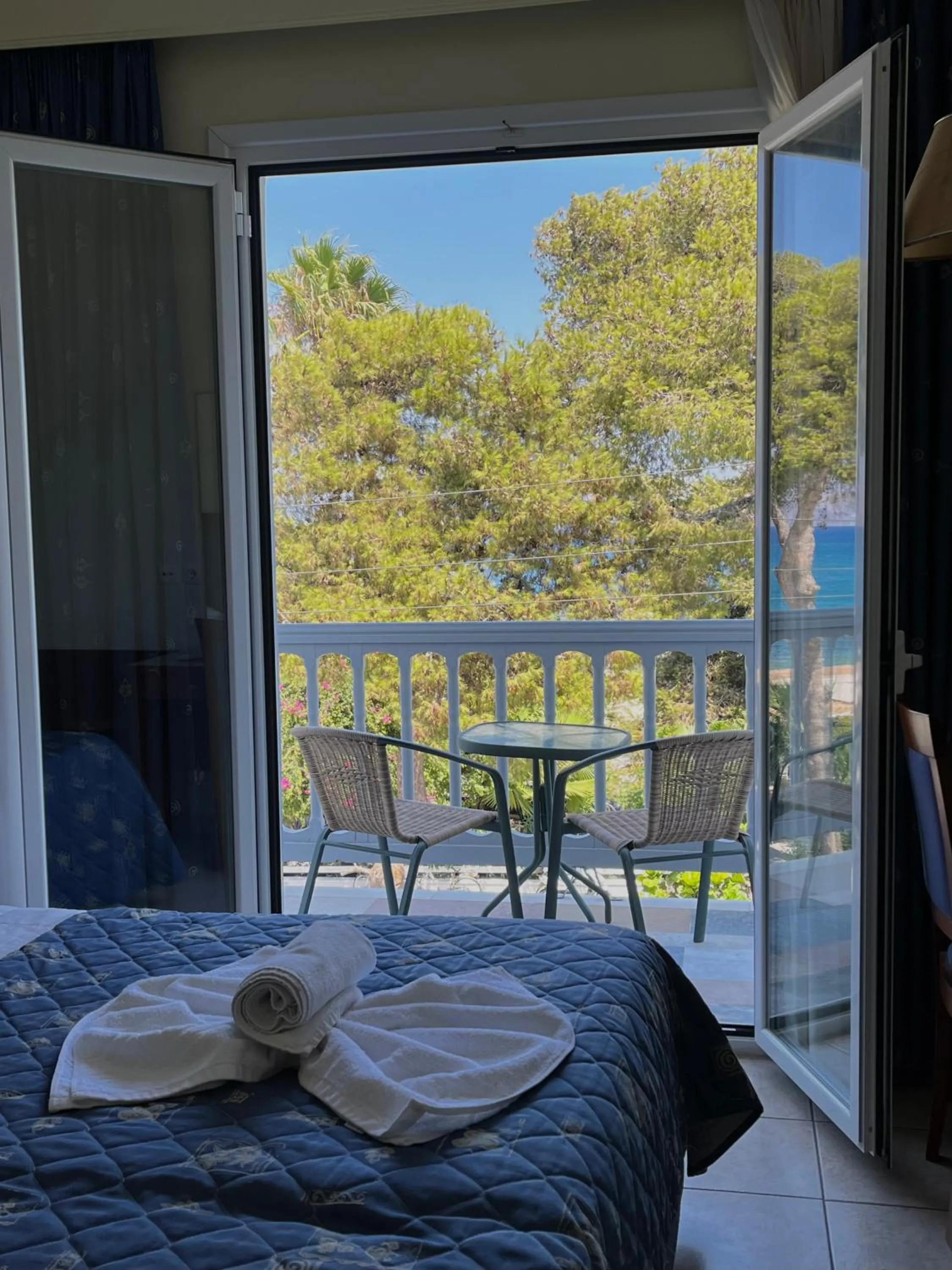 Bed in Theodorou Beach Hotel Apartments