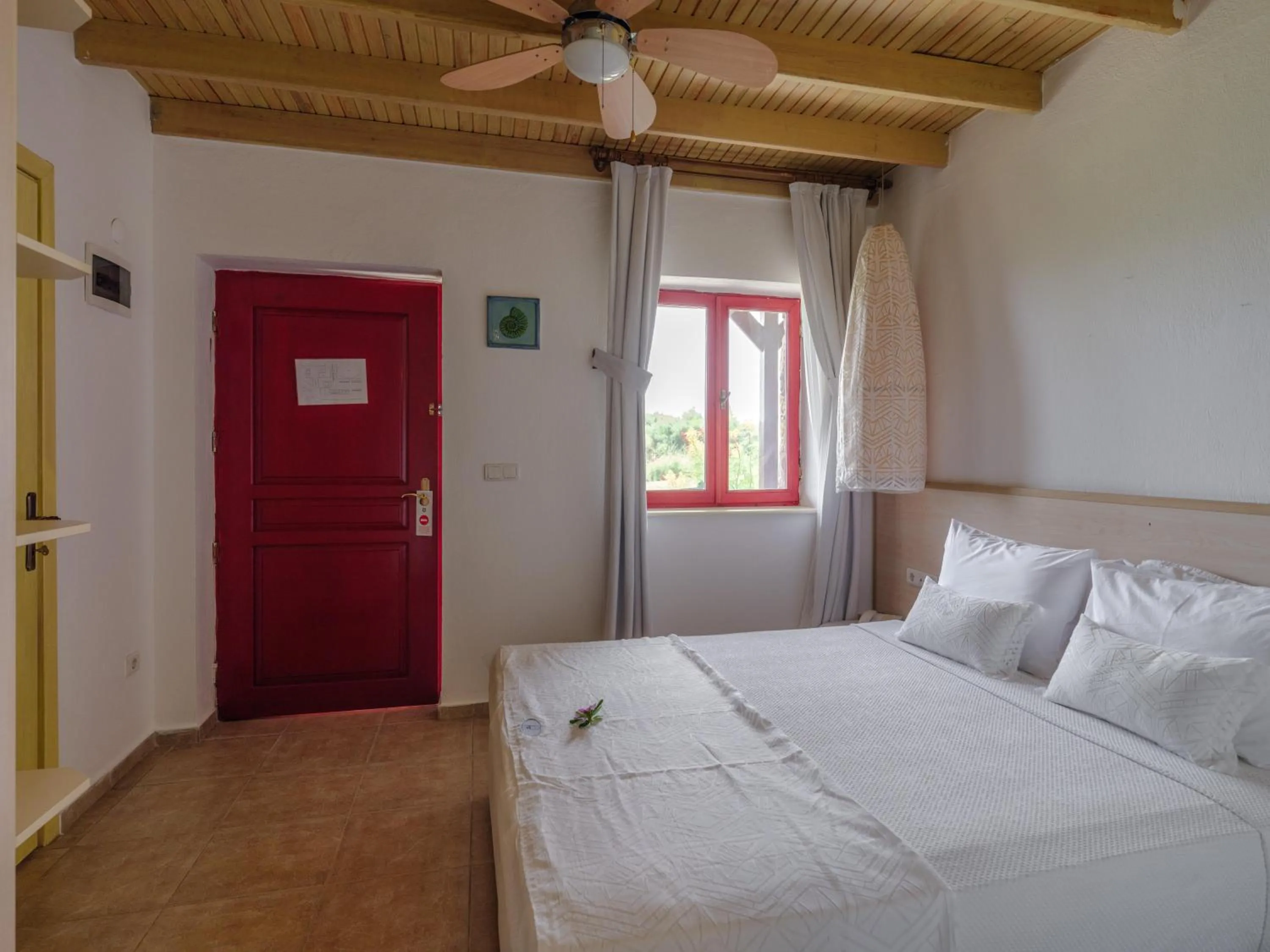 Photo of the whole room, Bed in Flow Datca Surf & Beach Hotel