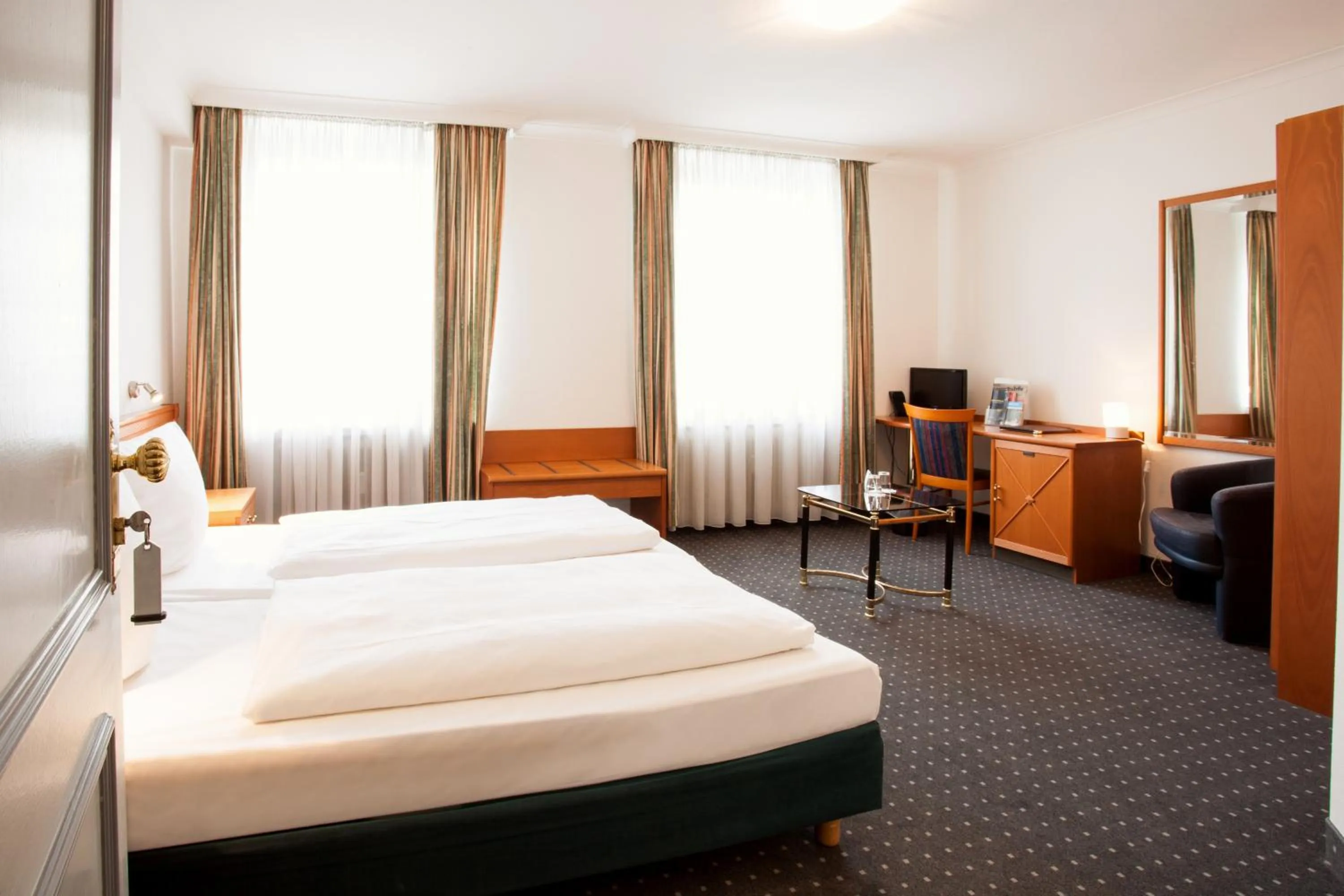 Photo of the whole room, Bed in INA Hotel Royal