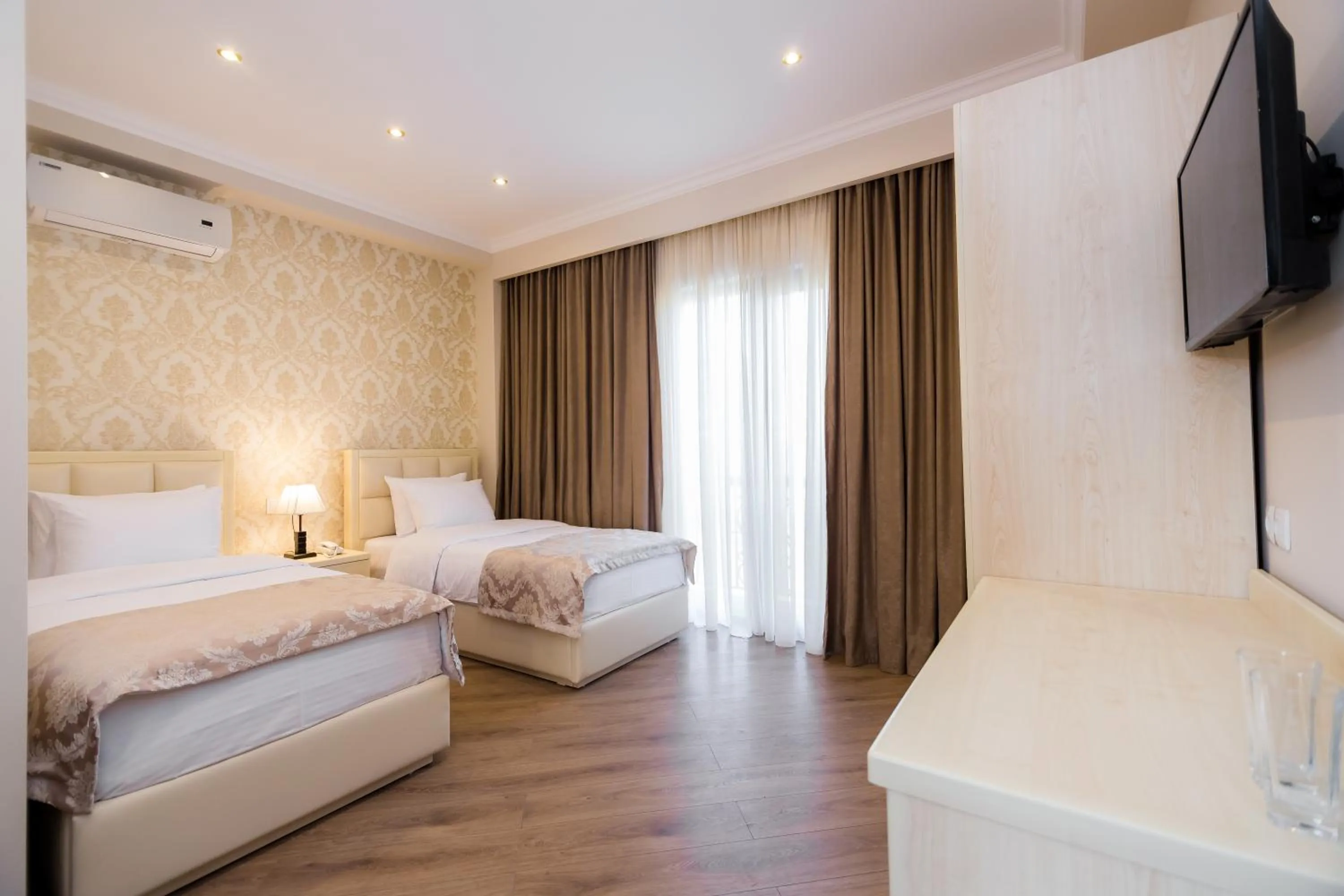 Photo of the whole room, Bed in Orchid Boutique Hotel