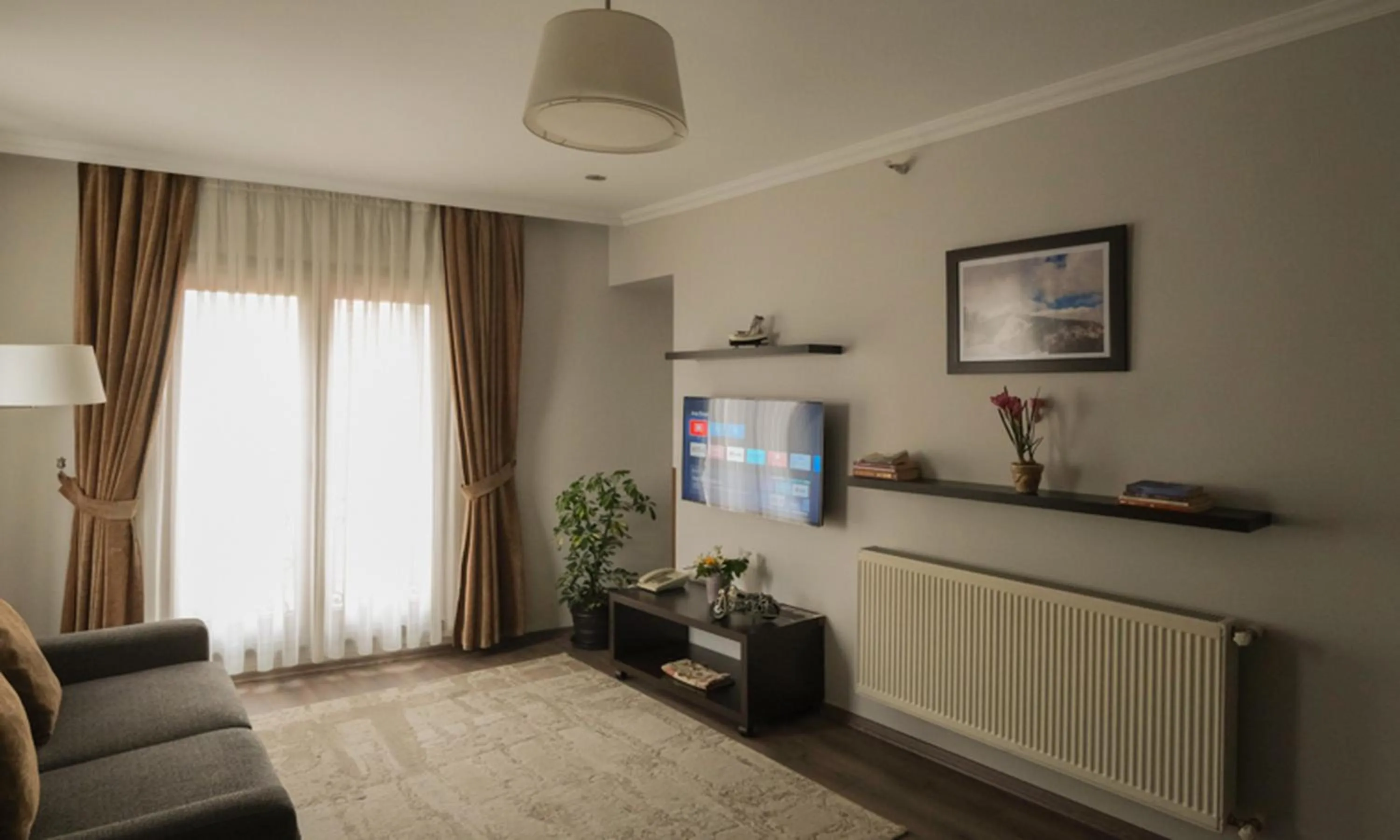 TV and multimedia in Belle Maison Hotel&Residence