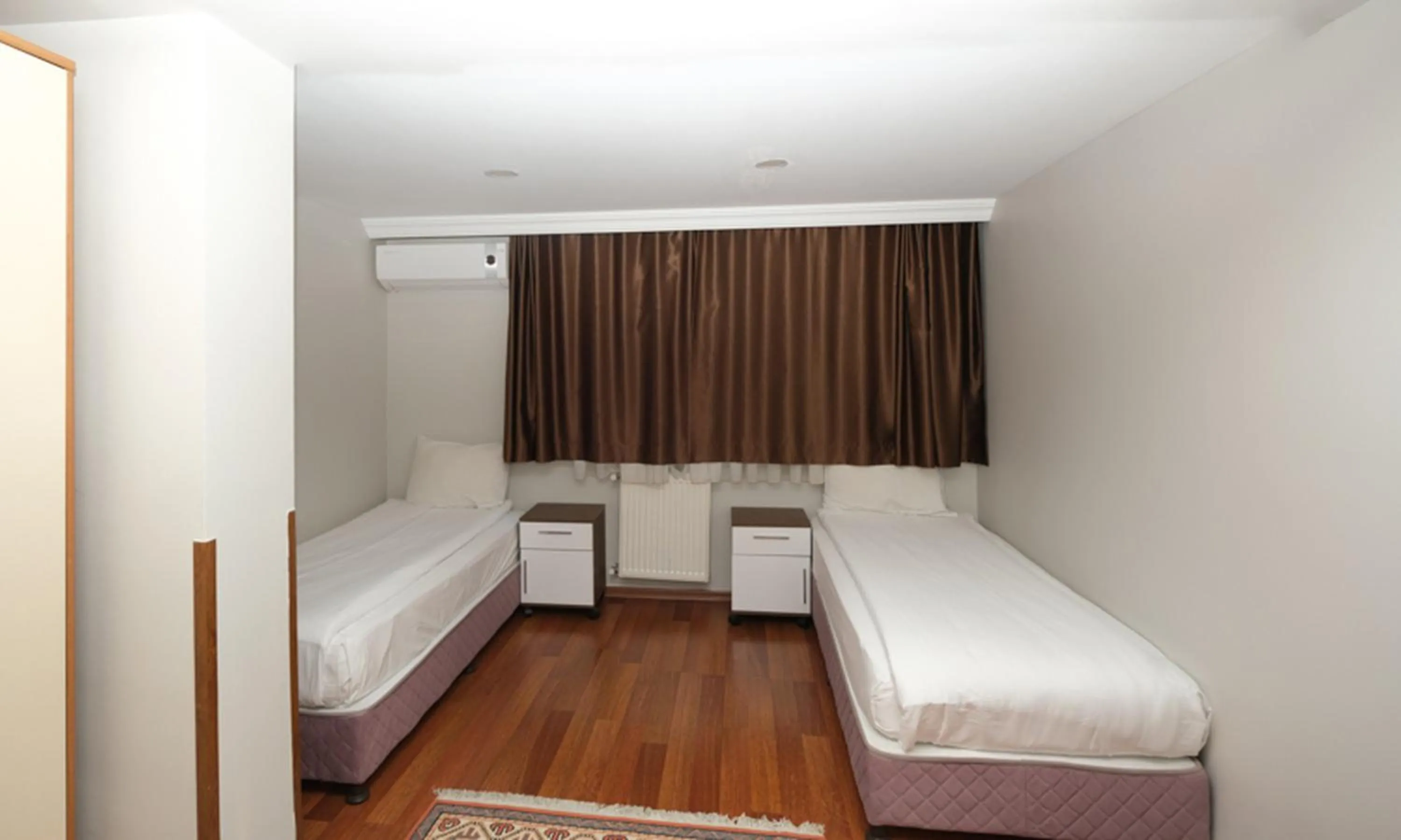 Bed in Belle Maison Hotel&Residence