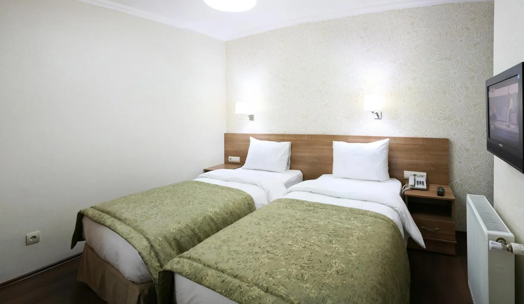 Bed in Belle Maison Hotel&Residence