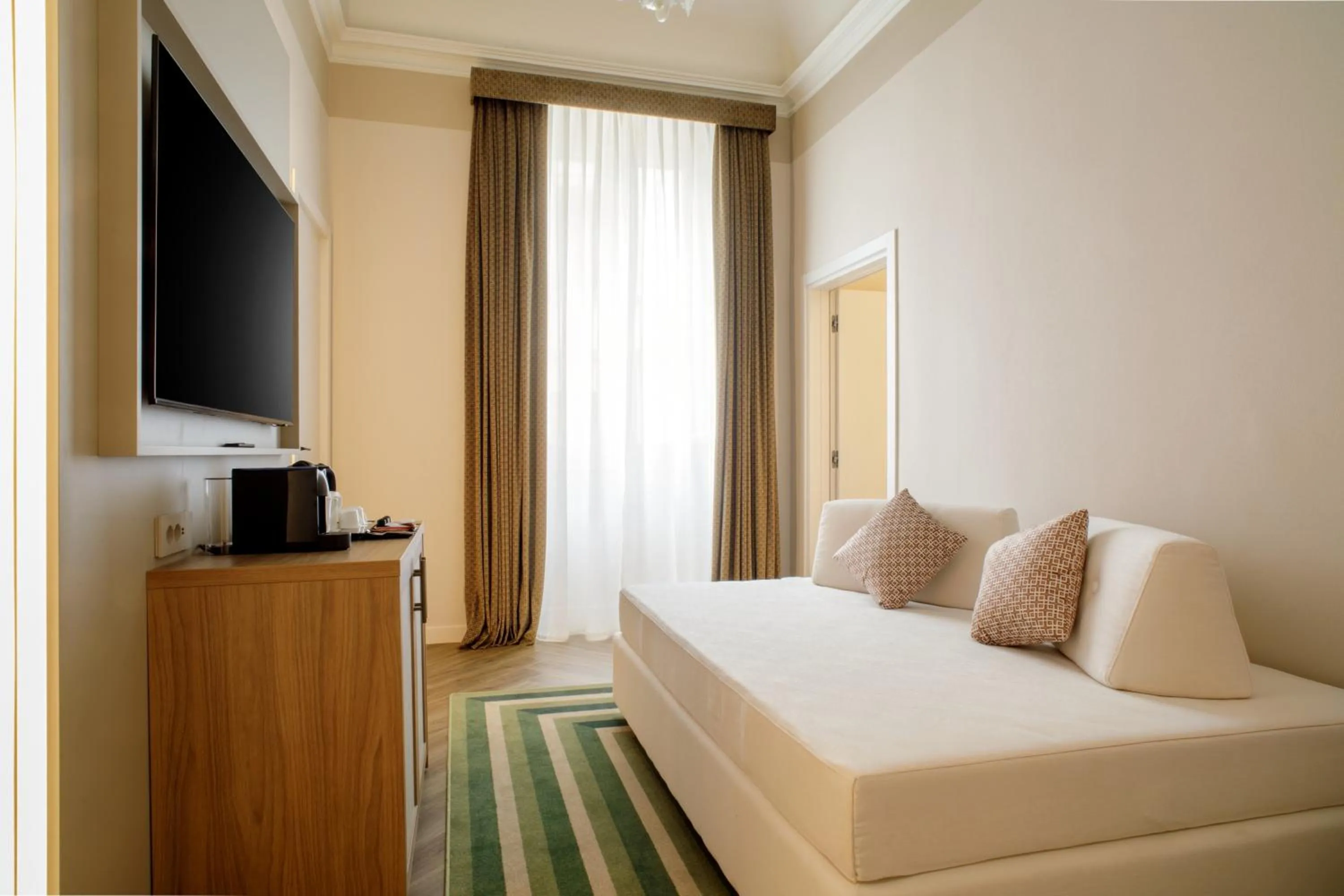 Bed in Rosetta Hotel Perugia Tapestry Collection By Hilton