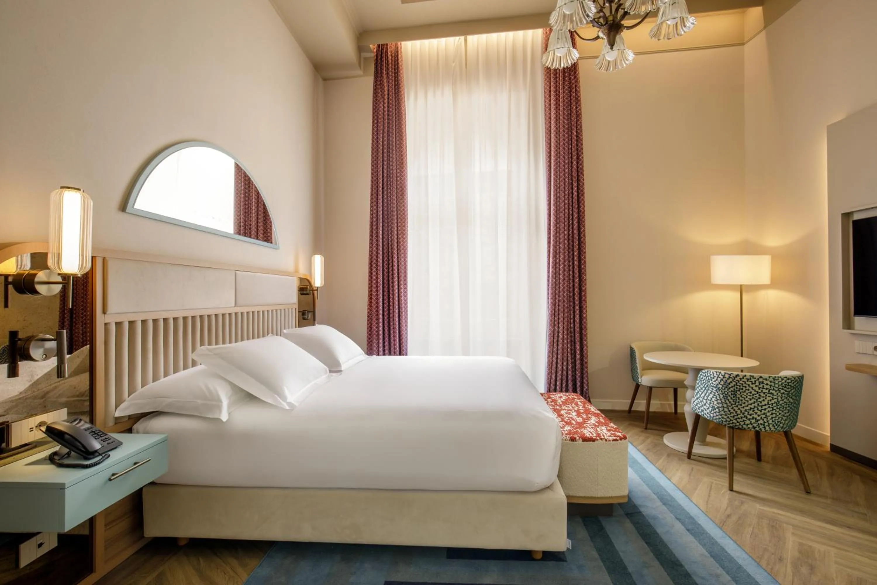 Bed in Rosetta Hotel Perugia Tapestry Collection By Hilton