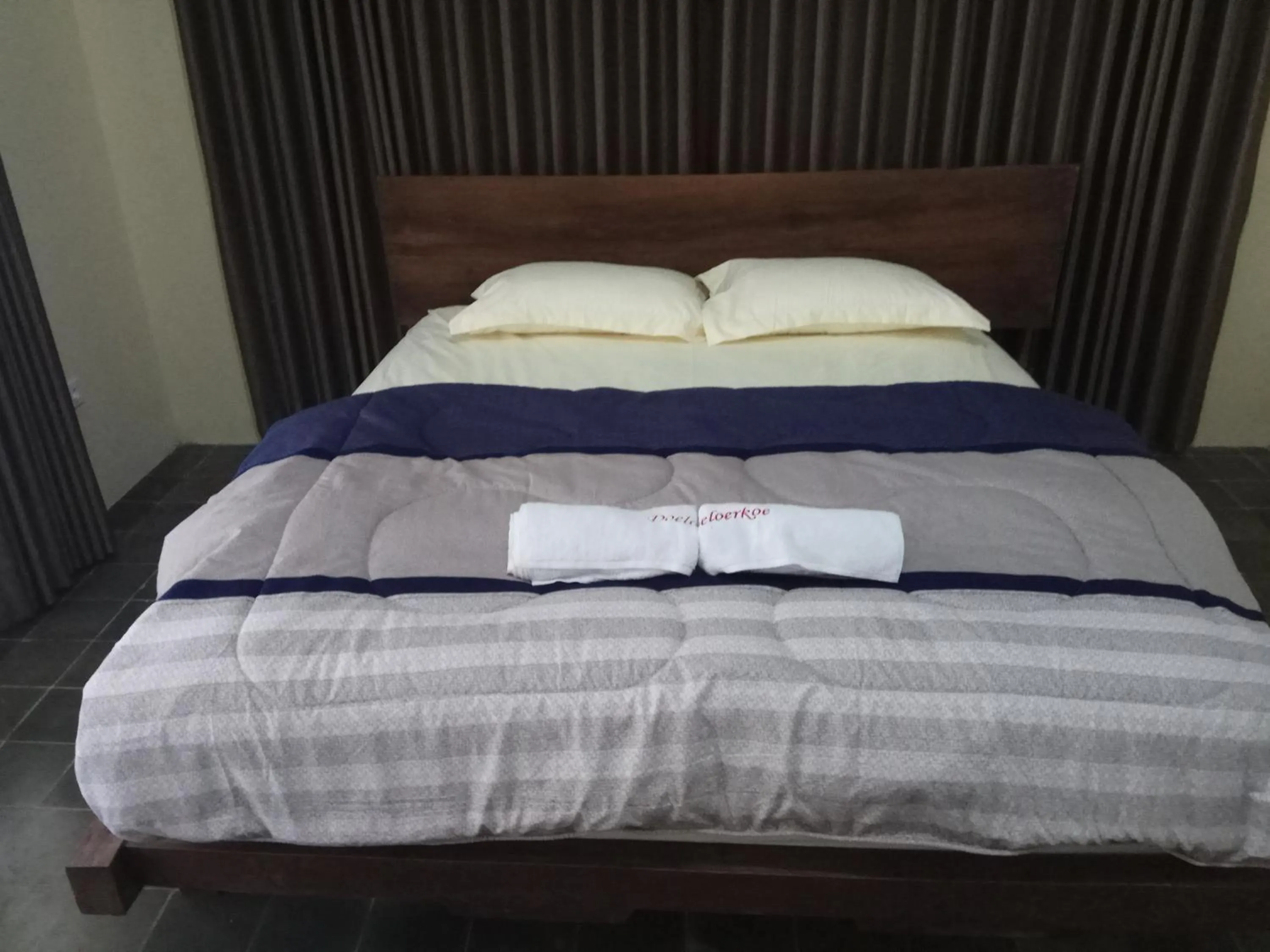 Bed in Doeloerkoe Homestay