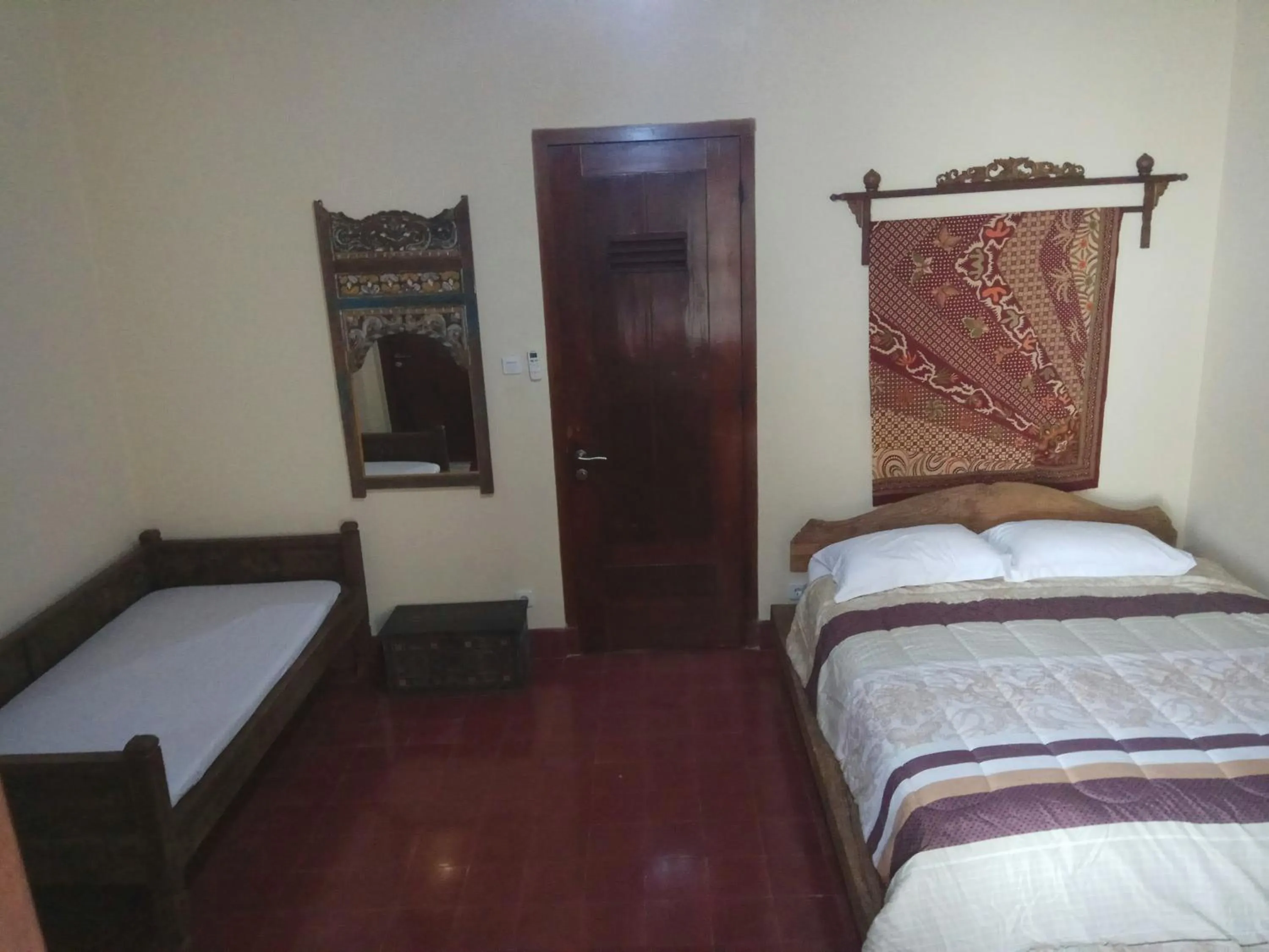 Bed in Doeloerkoe Homestay