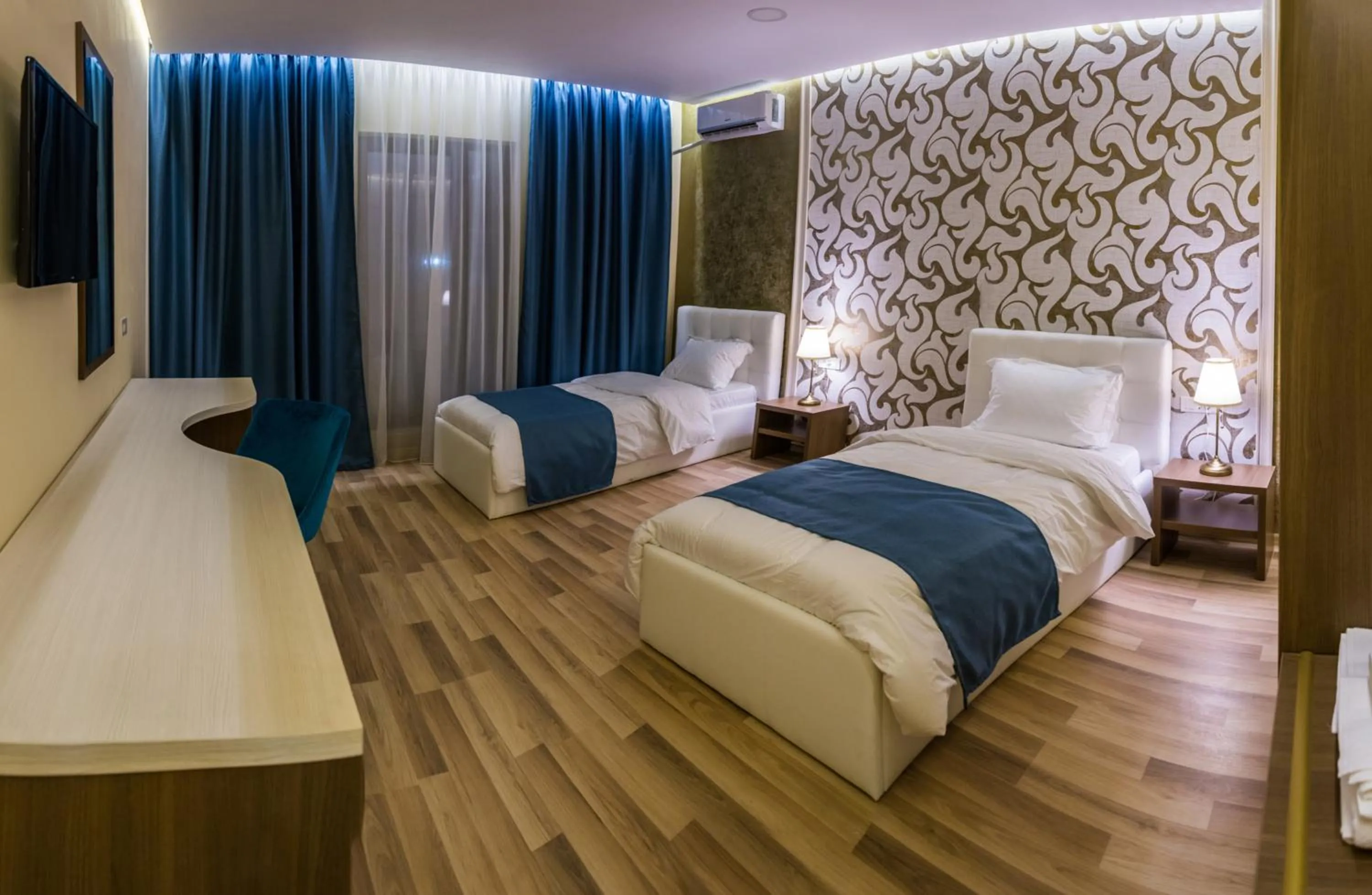 Photo of the whole room, Bed in Monopoly Hotel