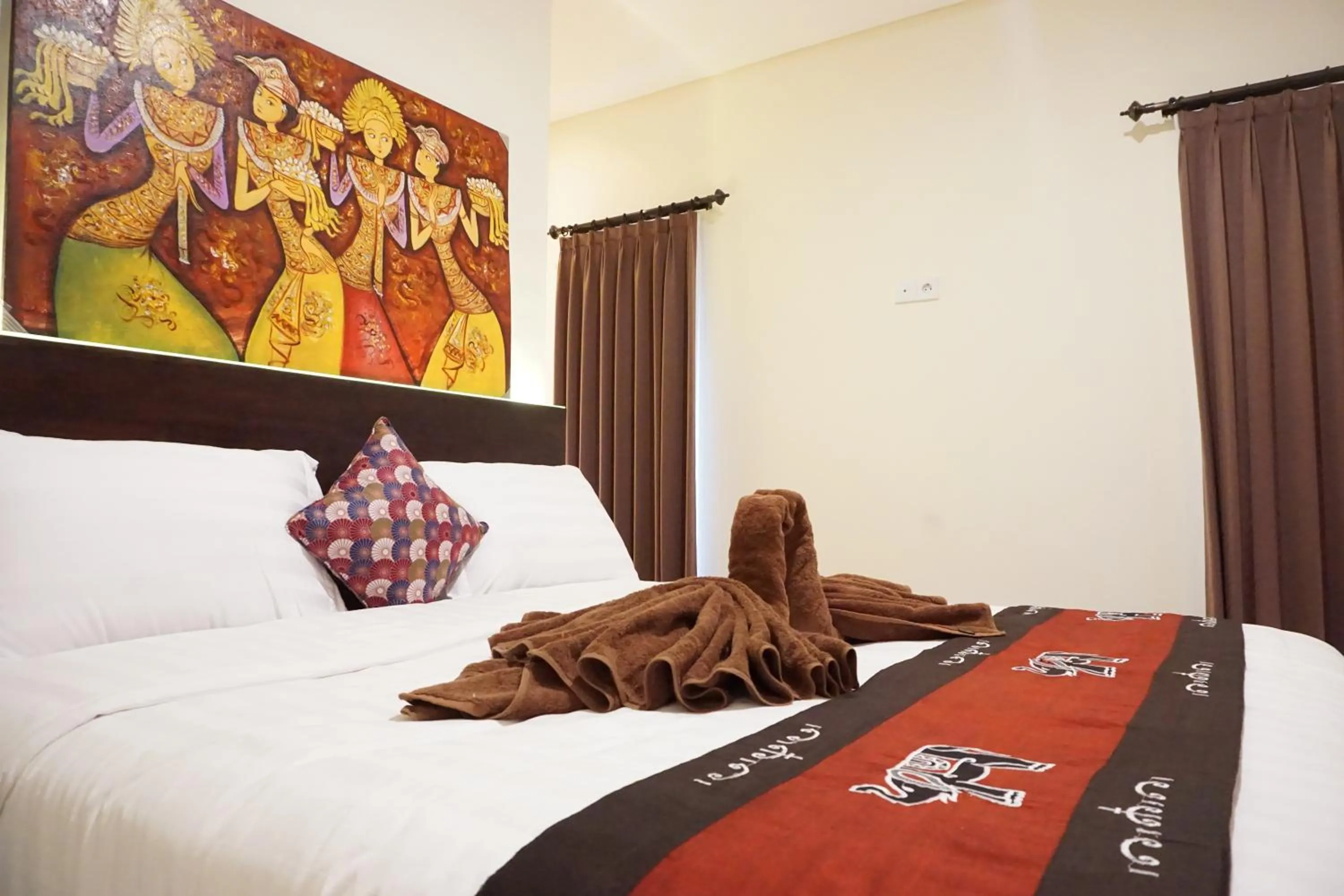 Bed in Pondok Uma Ubud