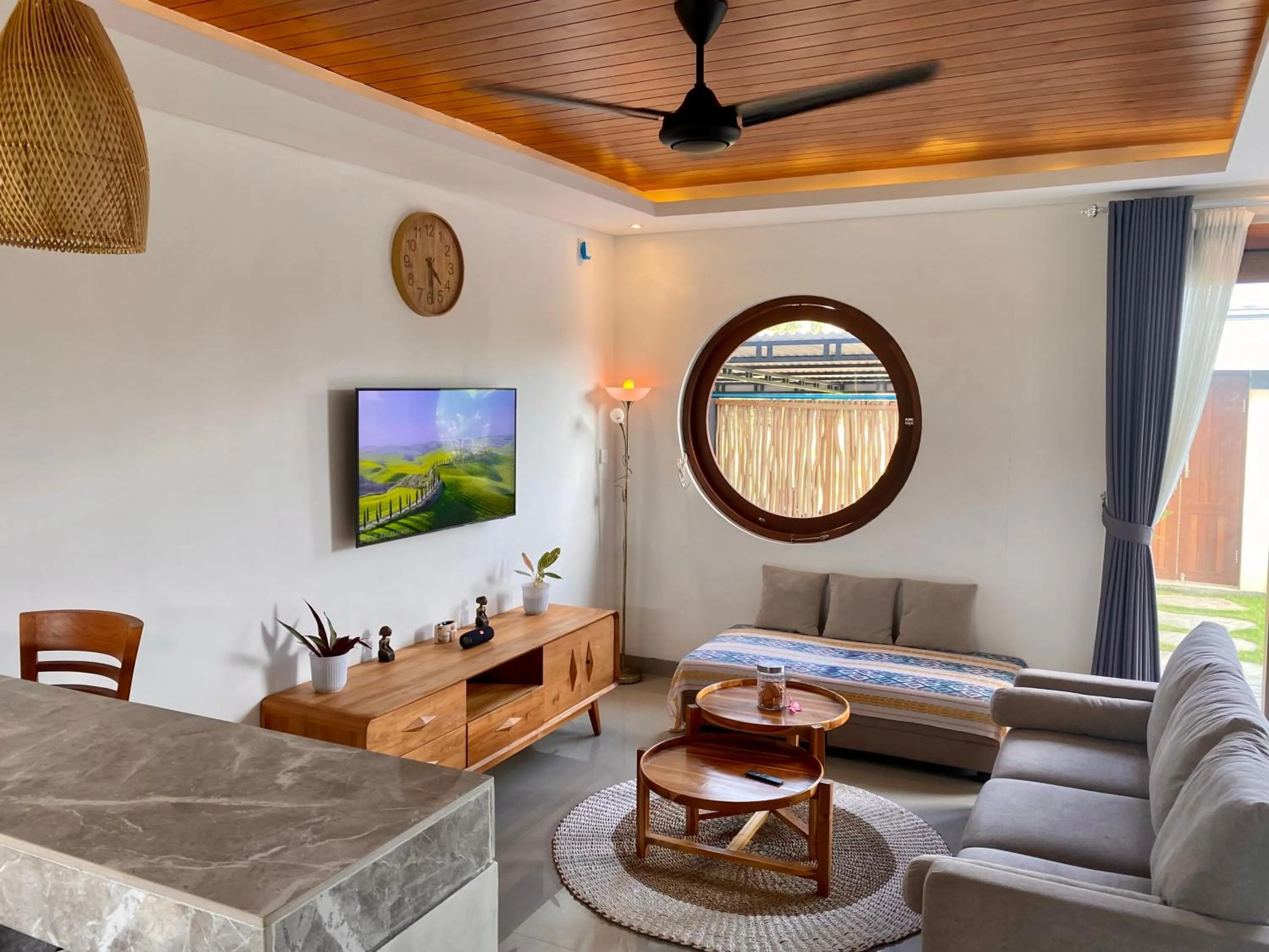 Communal lounge/ TV room in Pondok Uma Ubud