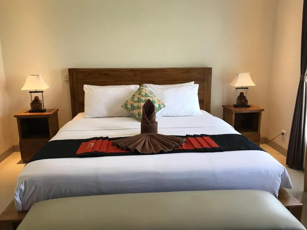 Bed in Pondok Uma Ubud