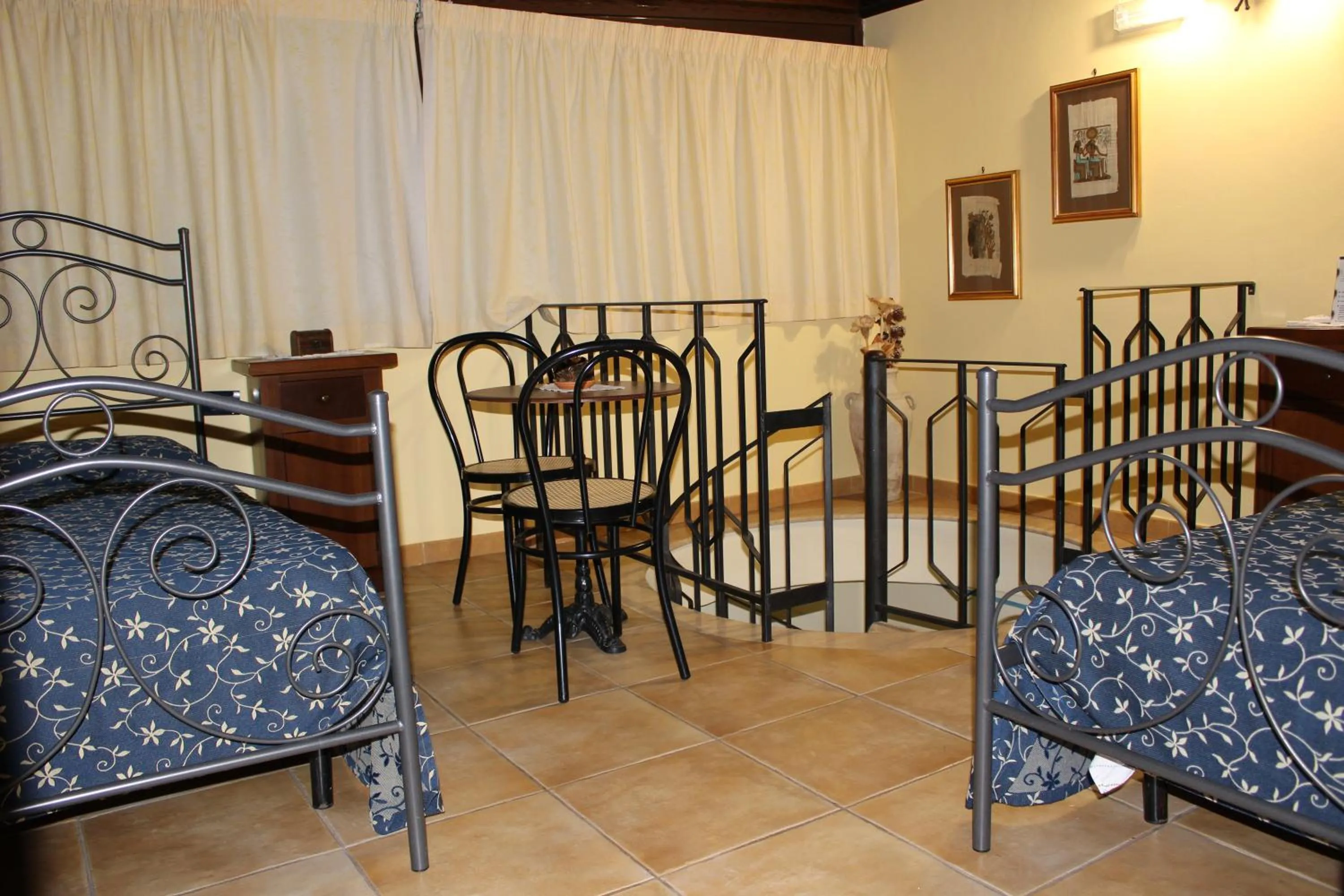 Quadruple Room with Balcony in Bed & Breakfasts Conte Perollo