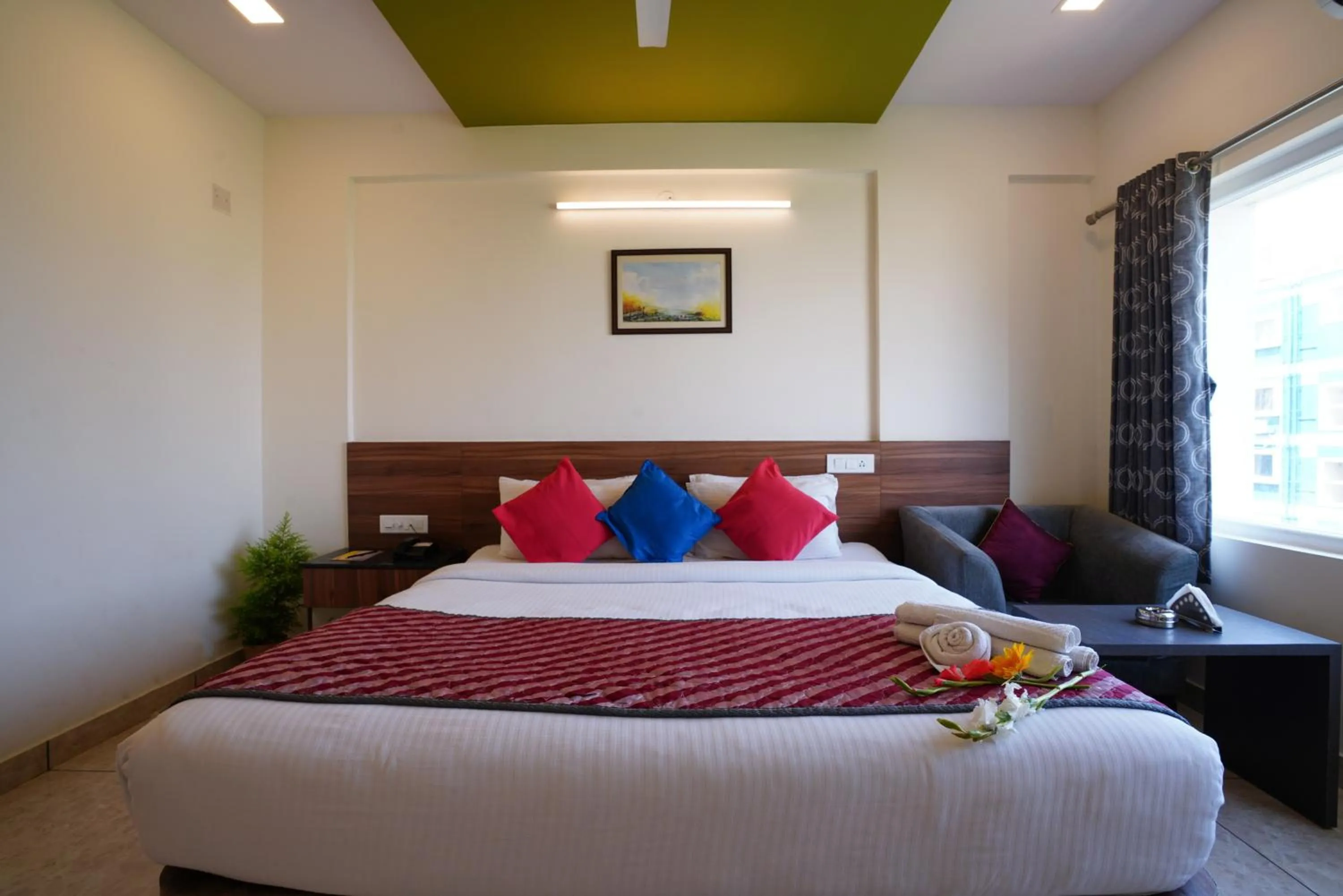 Bed in Silicon Inn Hotel Bangalore Airport