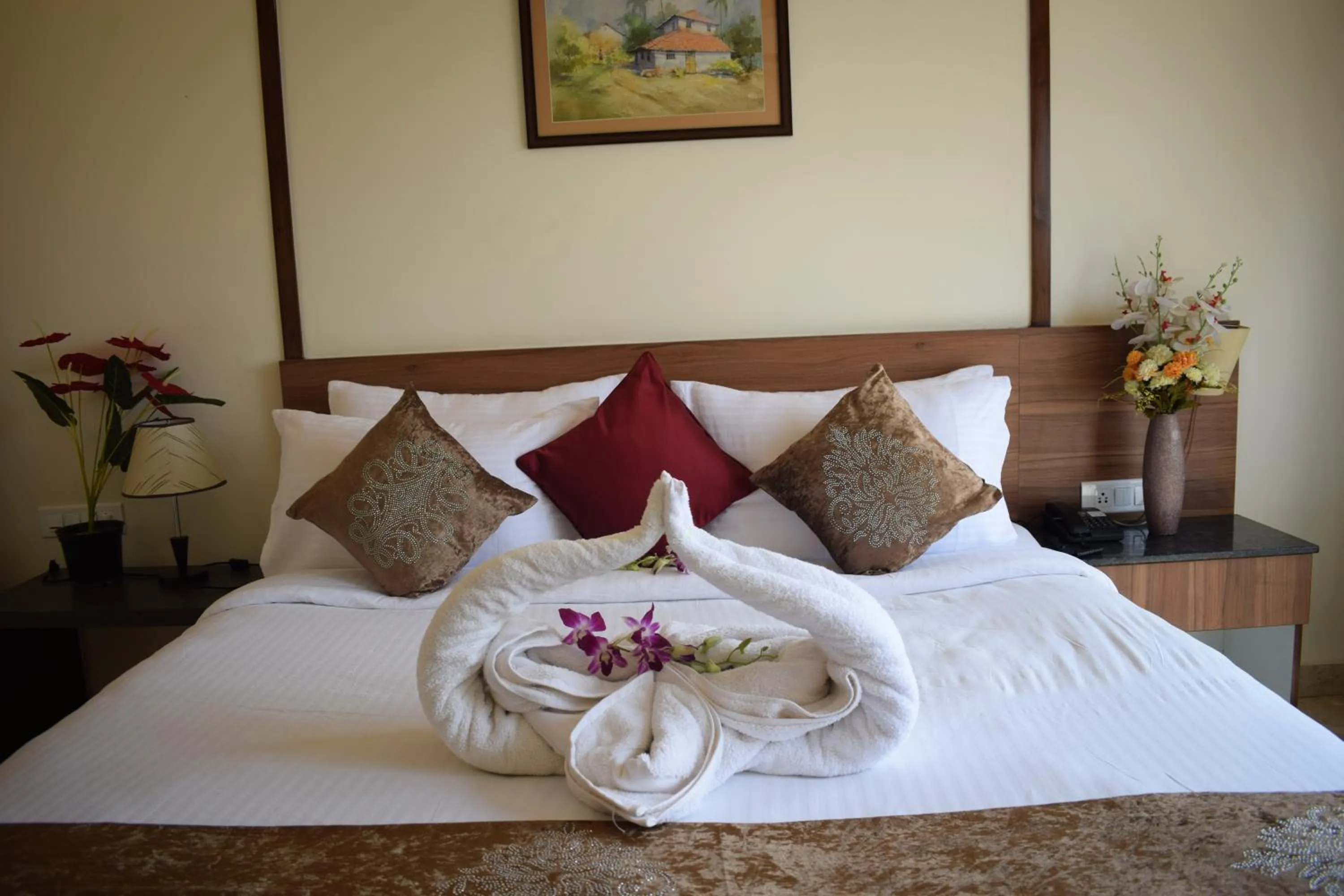 Bed in Silicon Inn Hotel Bangalore Airport