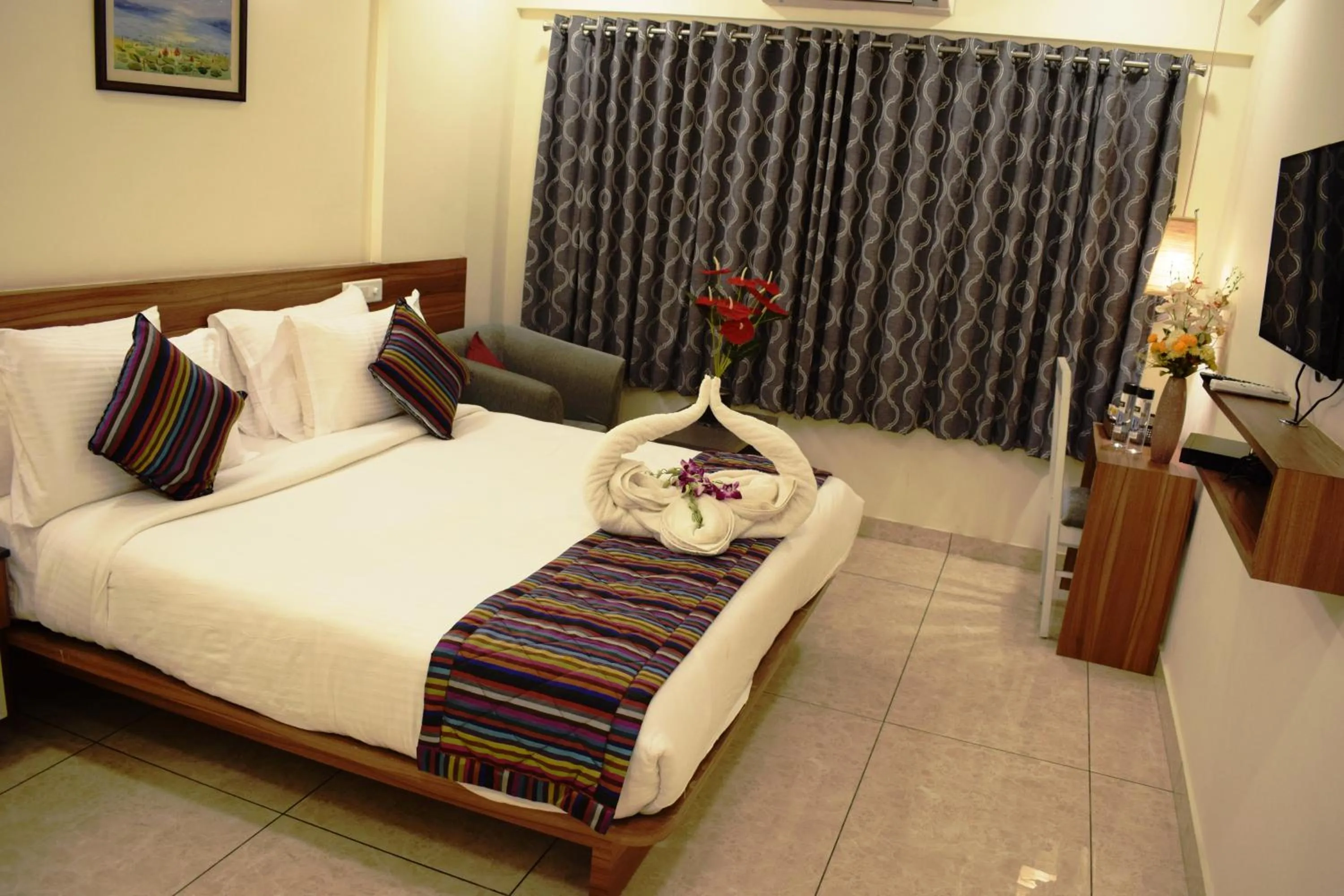 Bed in Silicon Inn Hotel Bangalore Airport