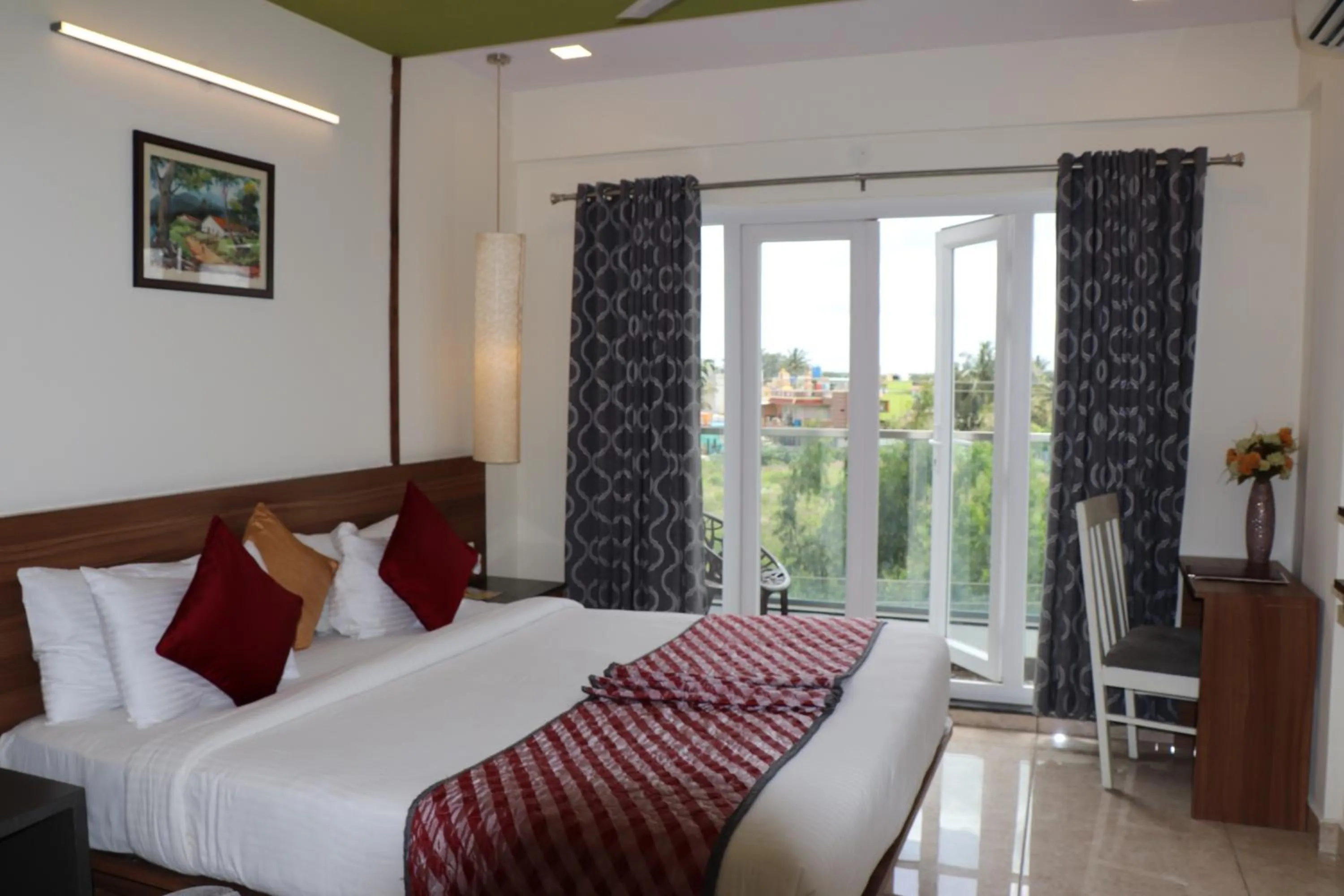 Photo of the whole room, Bed in Silicon Inn Hotel Bangalore Airport