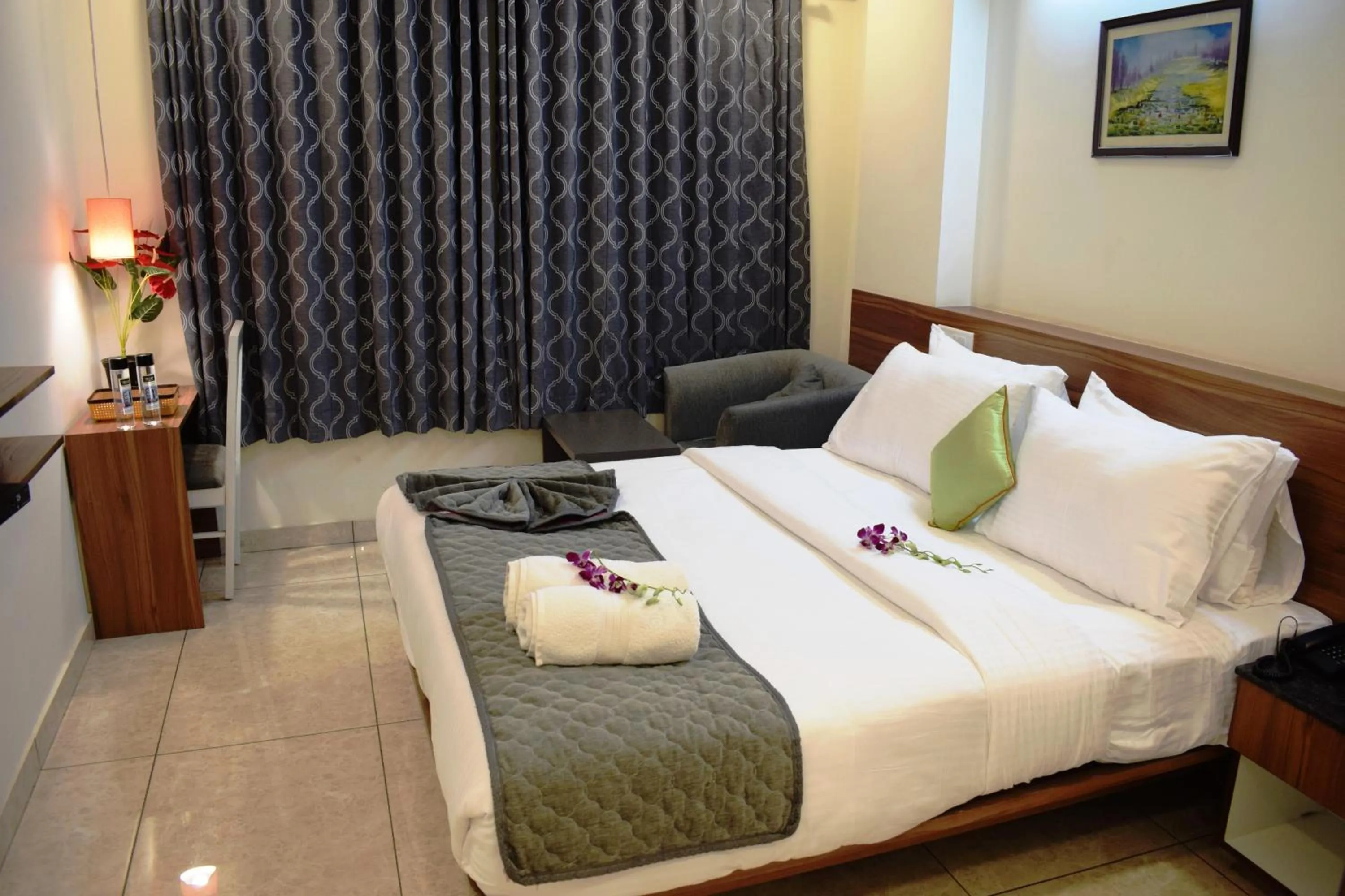 Bedroom, Bed in Silicon Inn Hotel Bangalore Airport