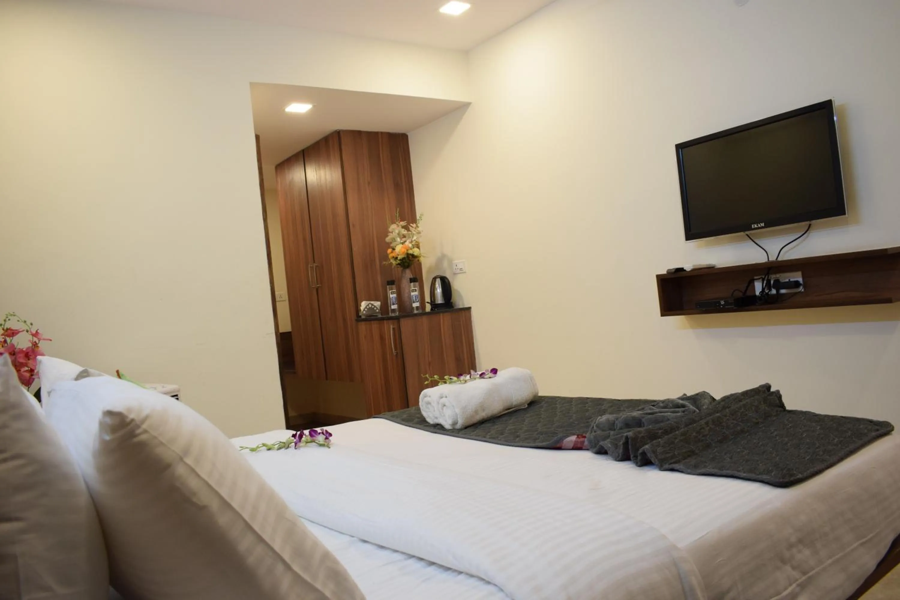 Bed in Silicon Inn Hotel Bangalore Airport