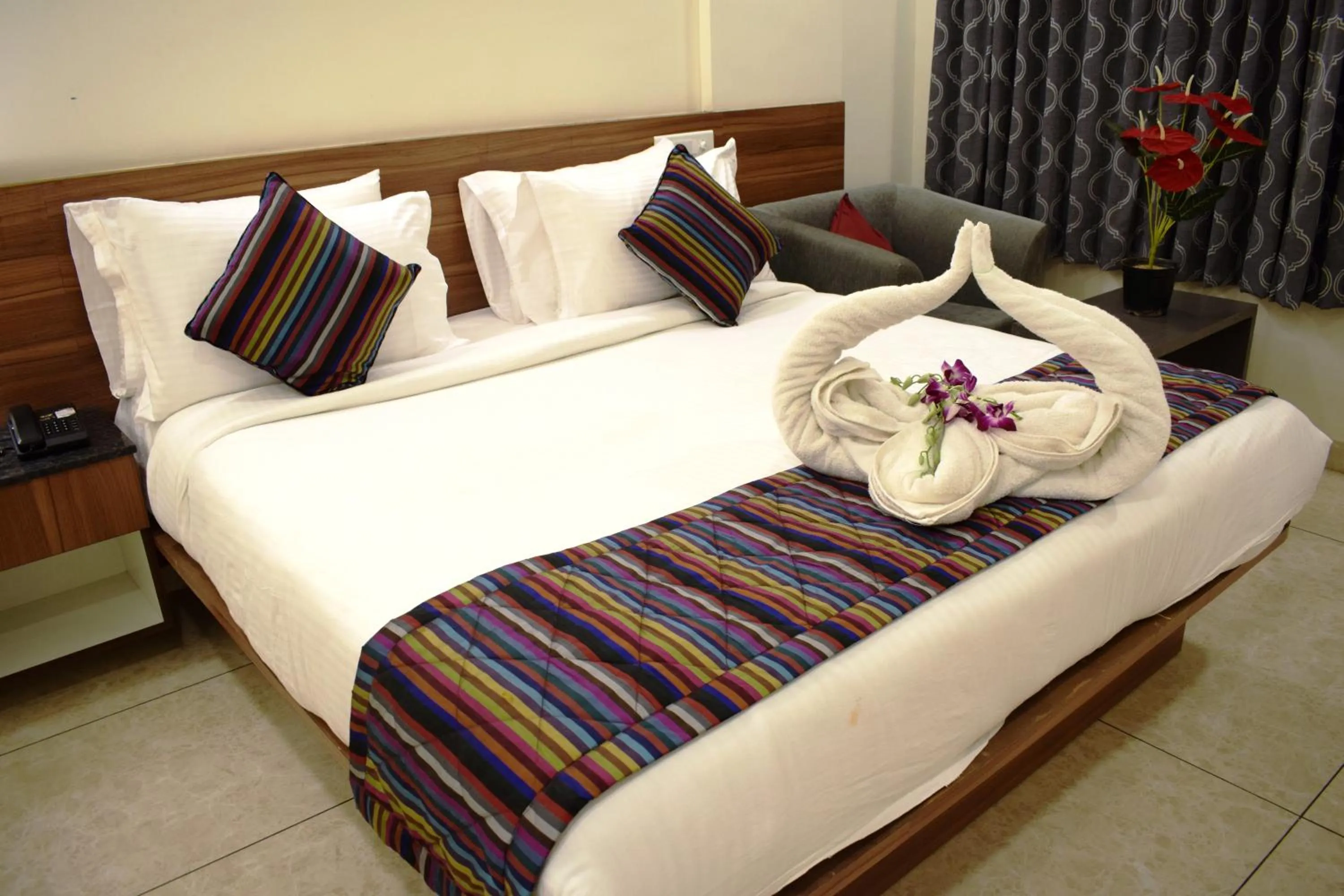 Bed in Silicon Inn Hotel Bangalore Airport