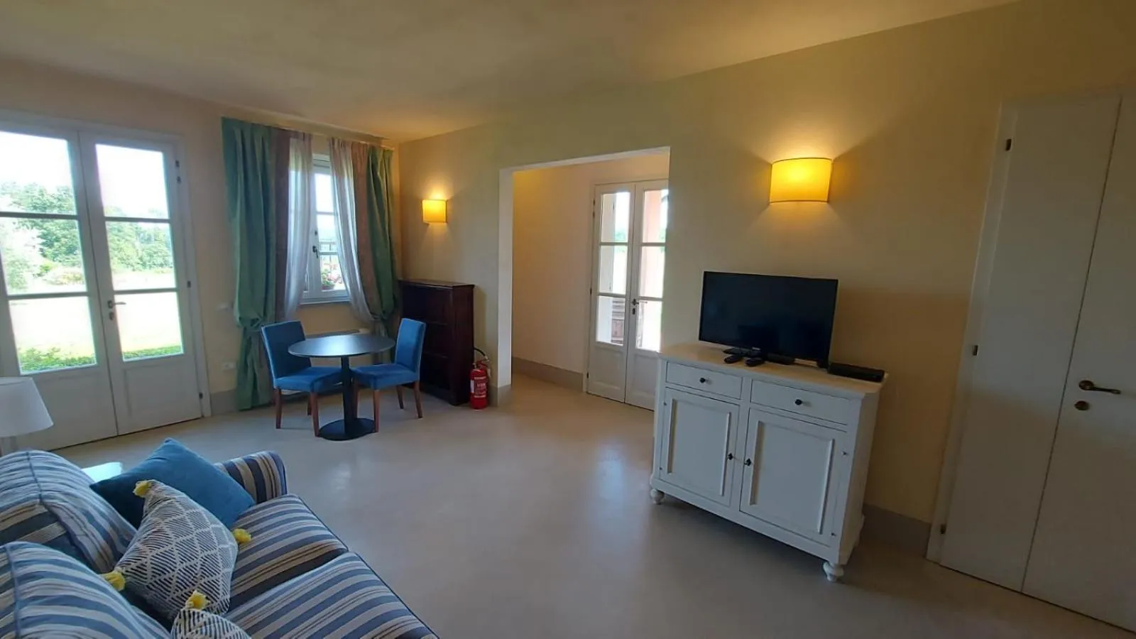 Communal lounge/ TV room in Le Sodole Country Resort & Golf