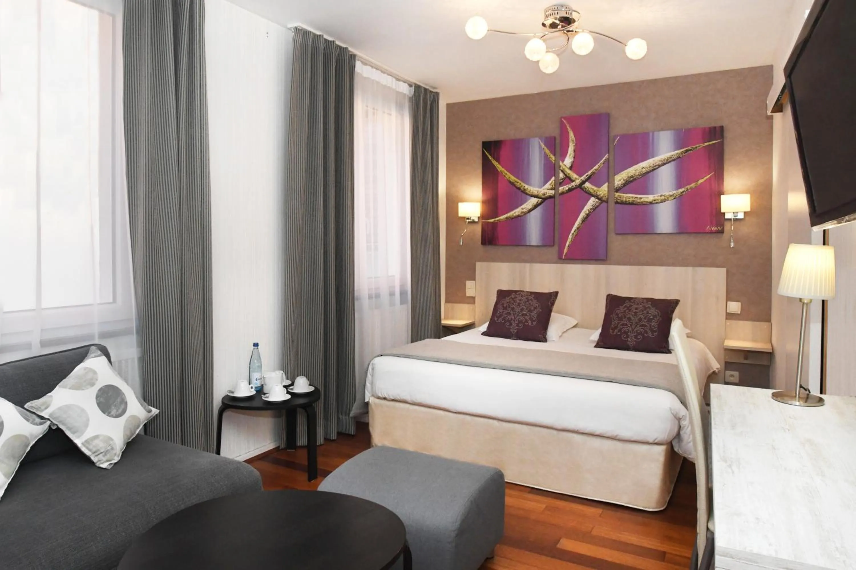 Photo of the whole room, Bed in Logis Hôtel du Centre - Halte idéale en cyclotourisme avec garage à vélos clos