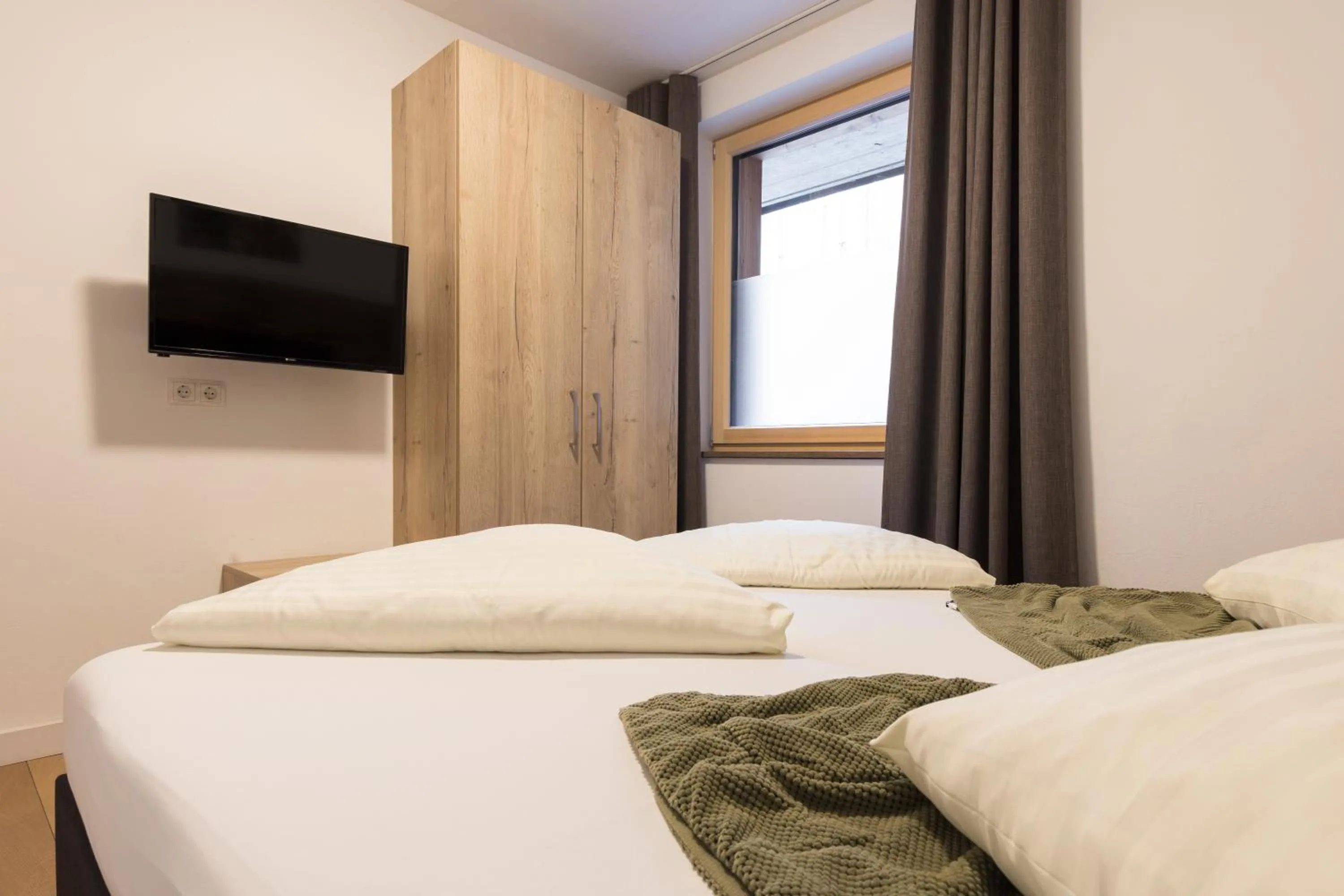 Bedroom, Bed in Aparthotel Herzblick GmbH