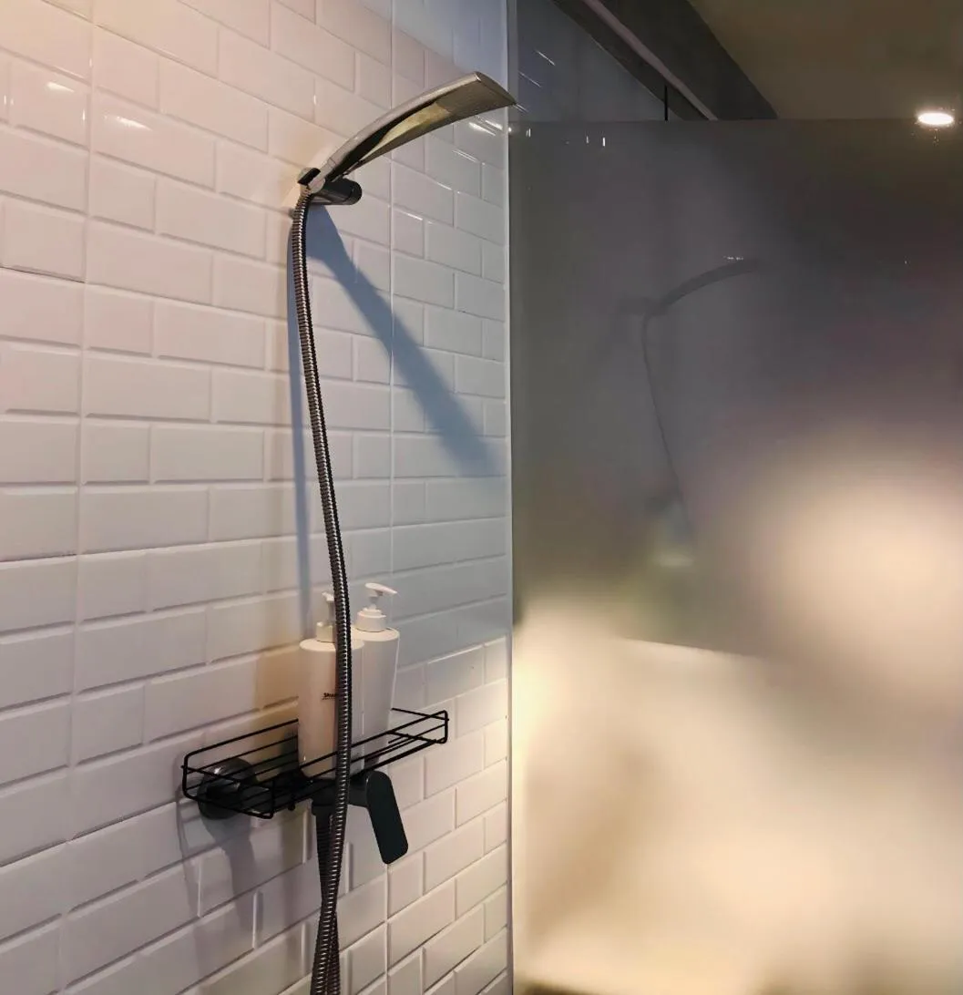 Shower in Bedspread Hostel