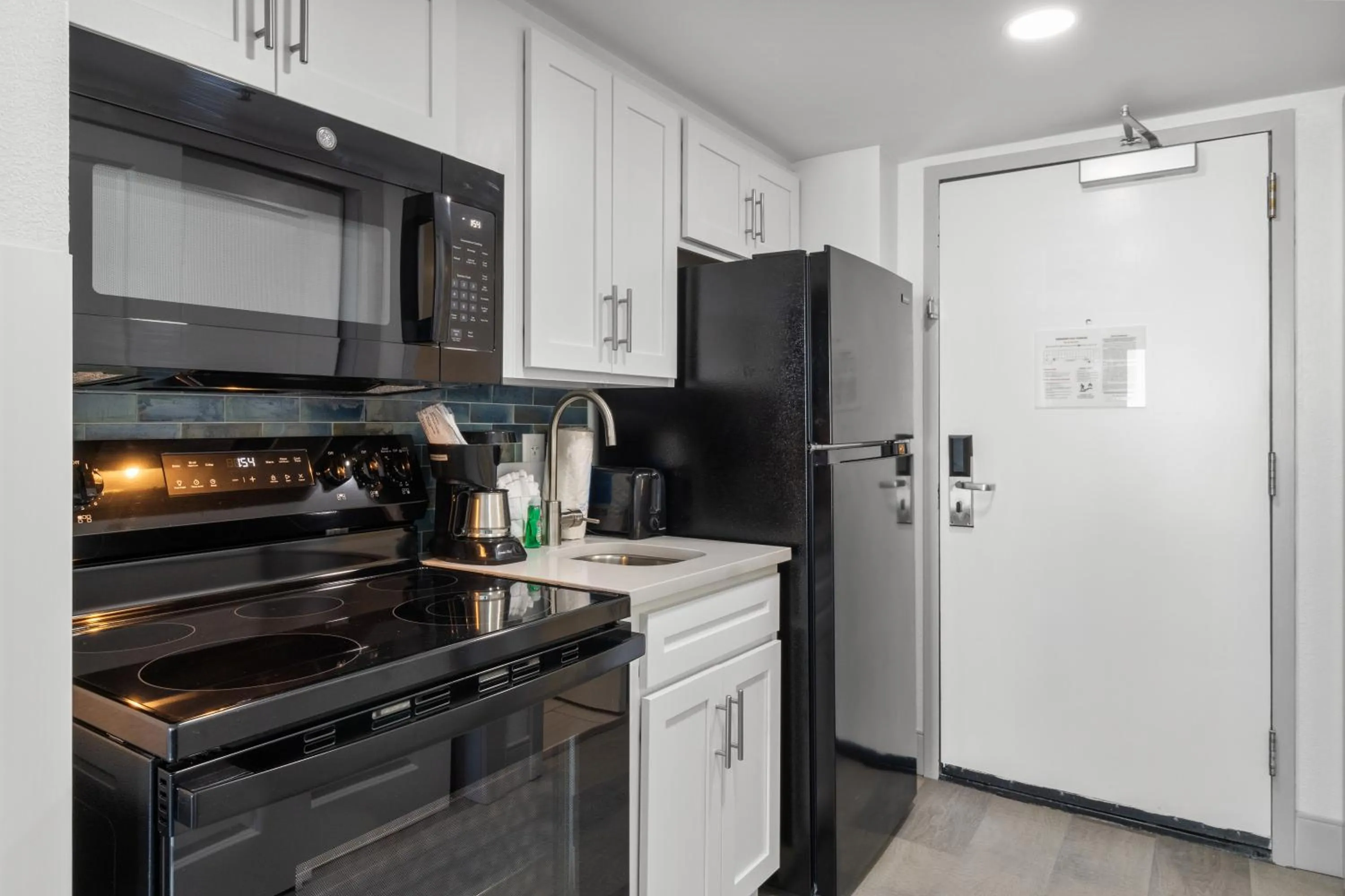 Kitchen or kitchenette in Compass Cove