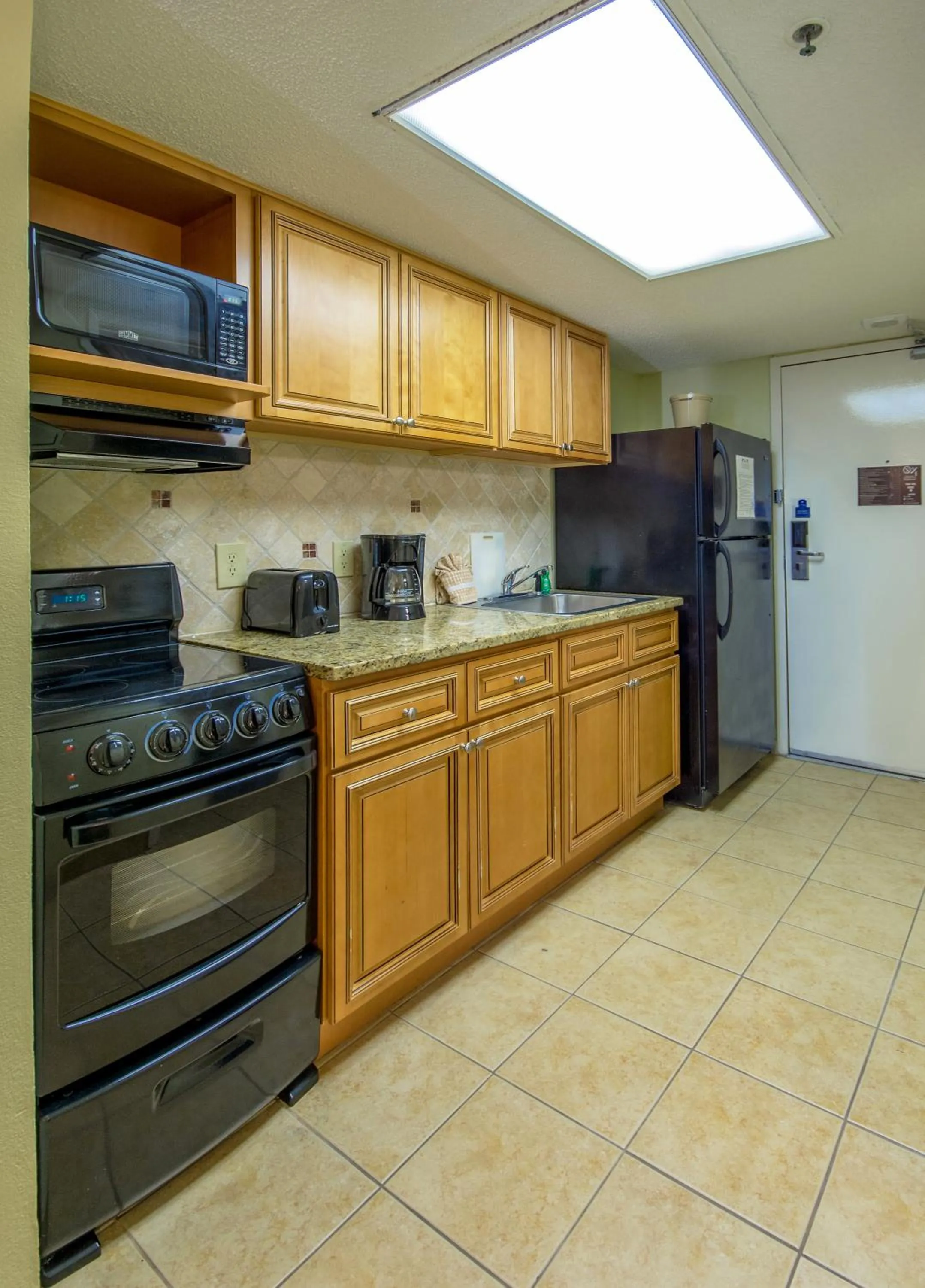 Kitchen or kitchenette in Compass Cove