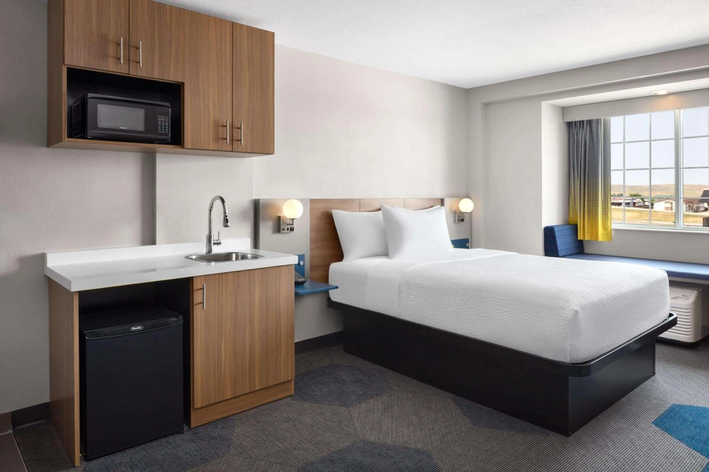 Photo of the whole room, Bed in Microtel Inn & Suites by Wyndham Rapid City