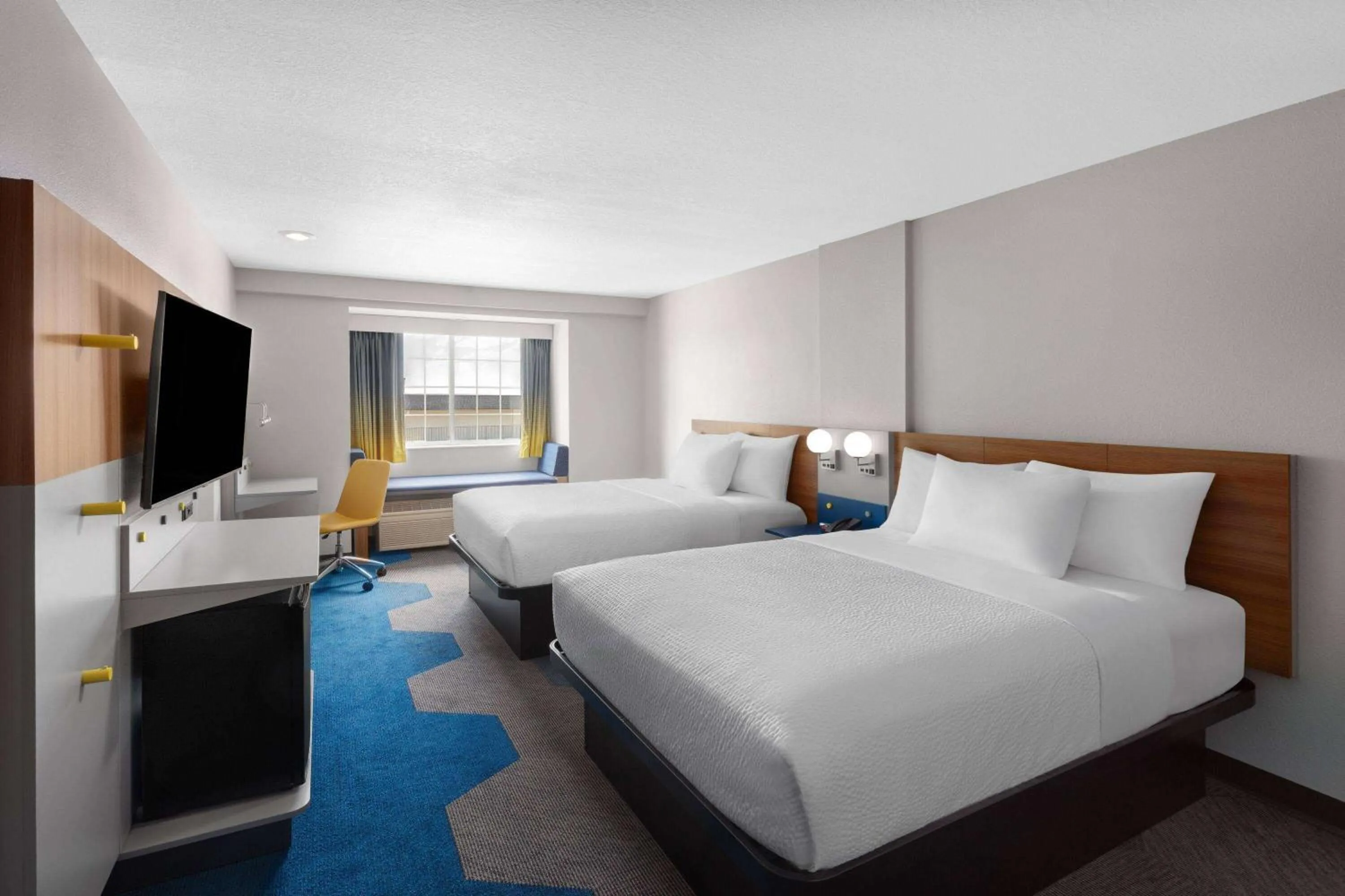 Photo of the whole room, Bed in Microtel Inn & Suites by Wyndham Rapid City