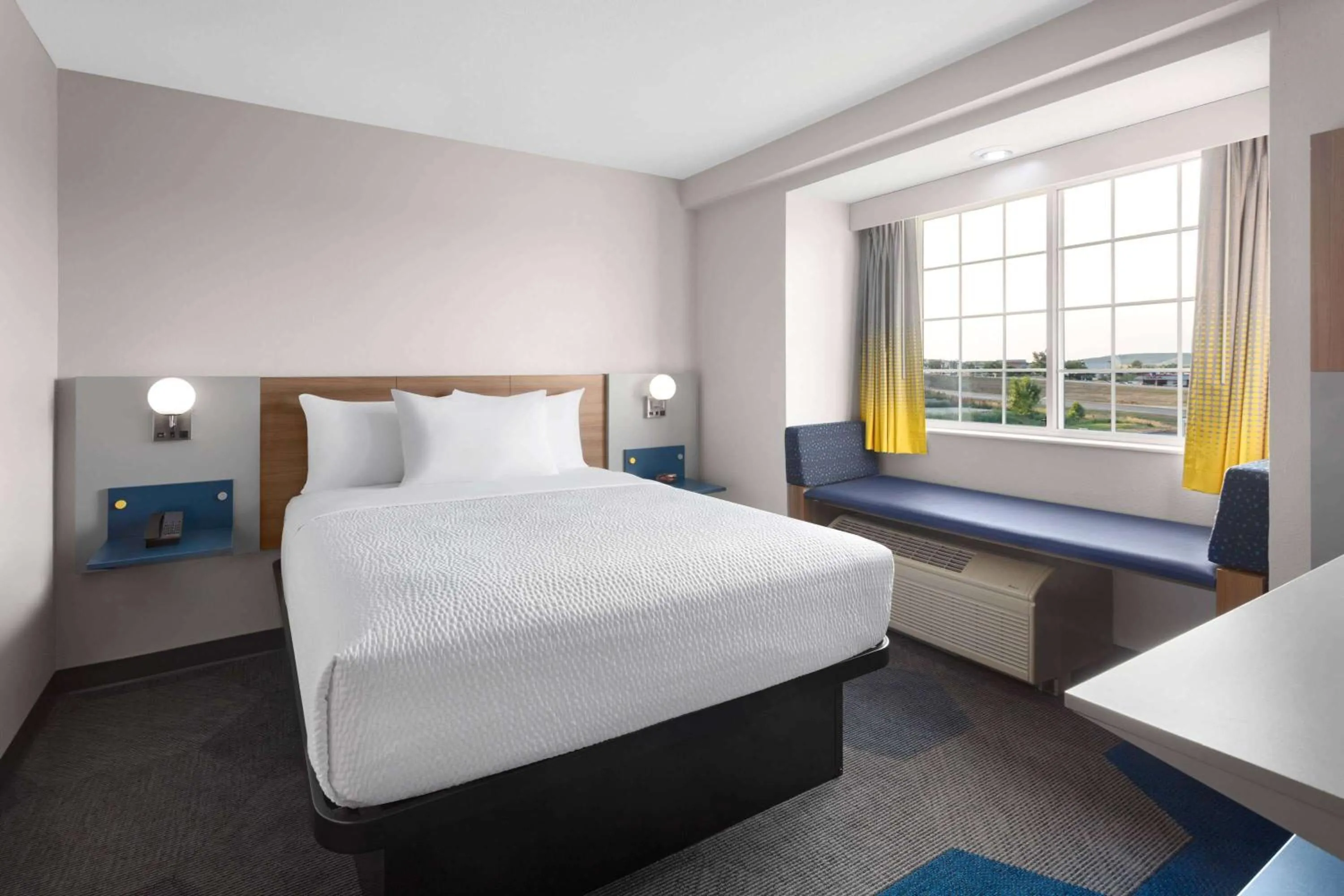 Photo of the whole room, Bed in Microtel Inn & Suites by Wyndham Rapid City