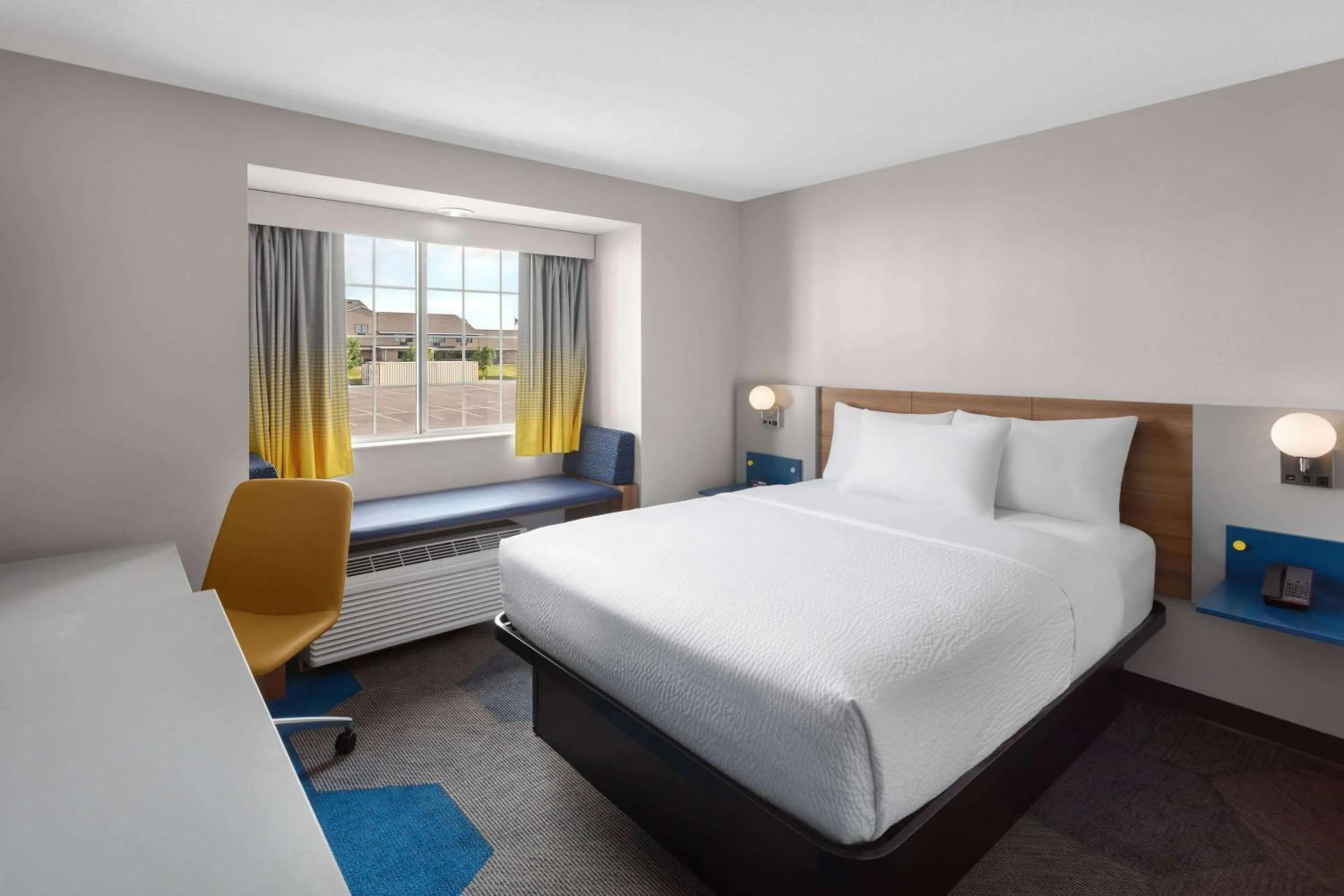 Photo of the whole room, Bed in Microtel Inn & Suites by Wyndham Rapid City