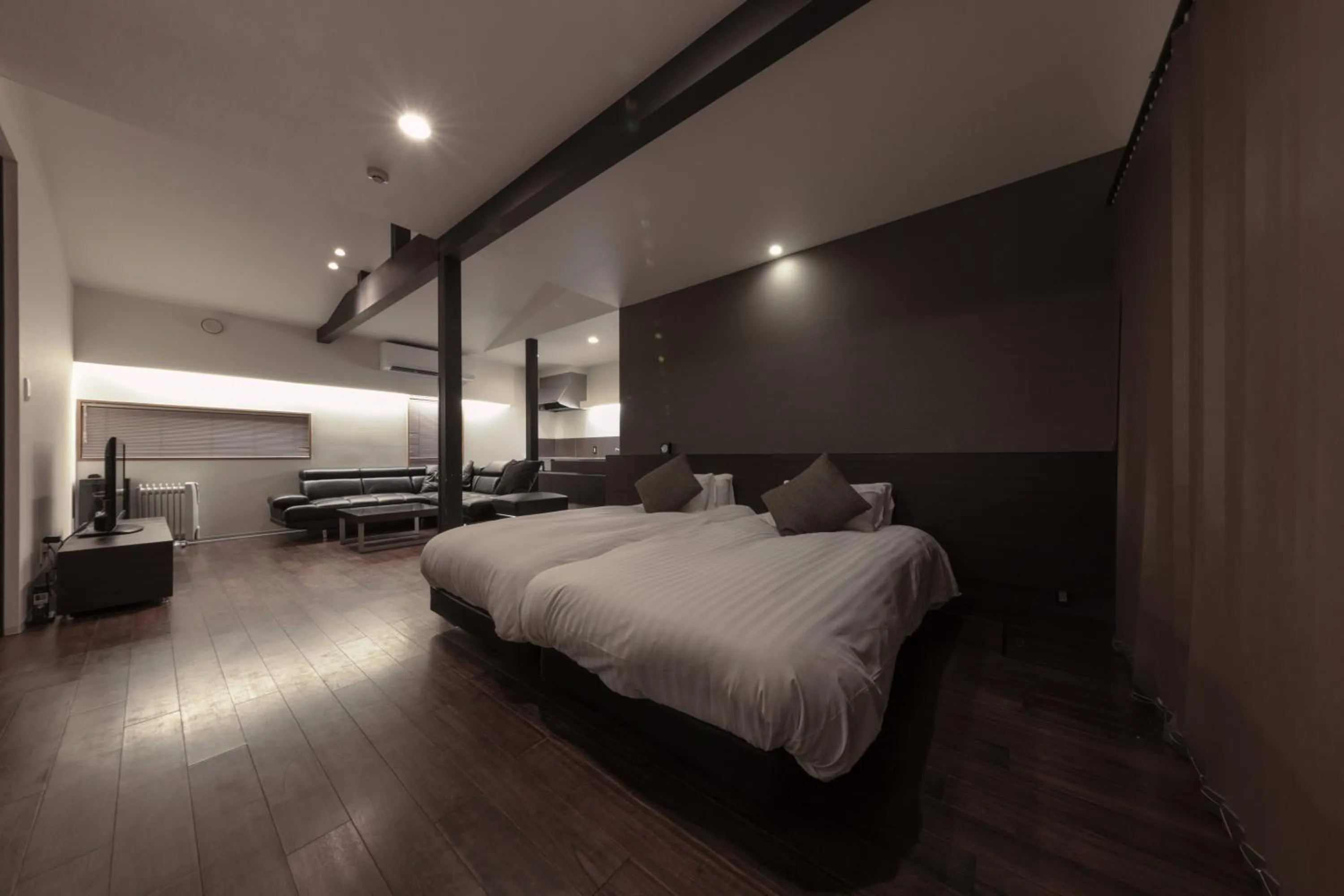 Living room, Bed in Furano Natulux Hotel