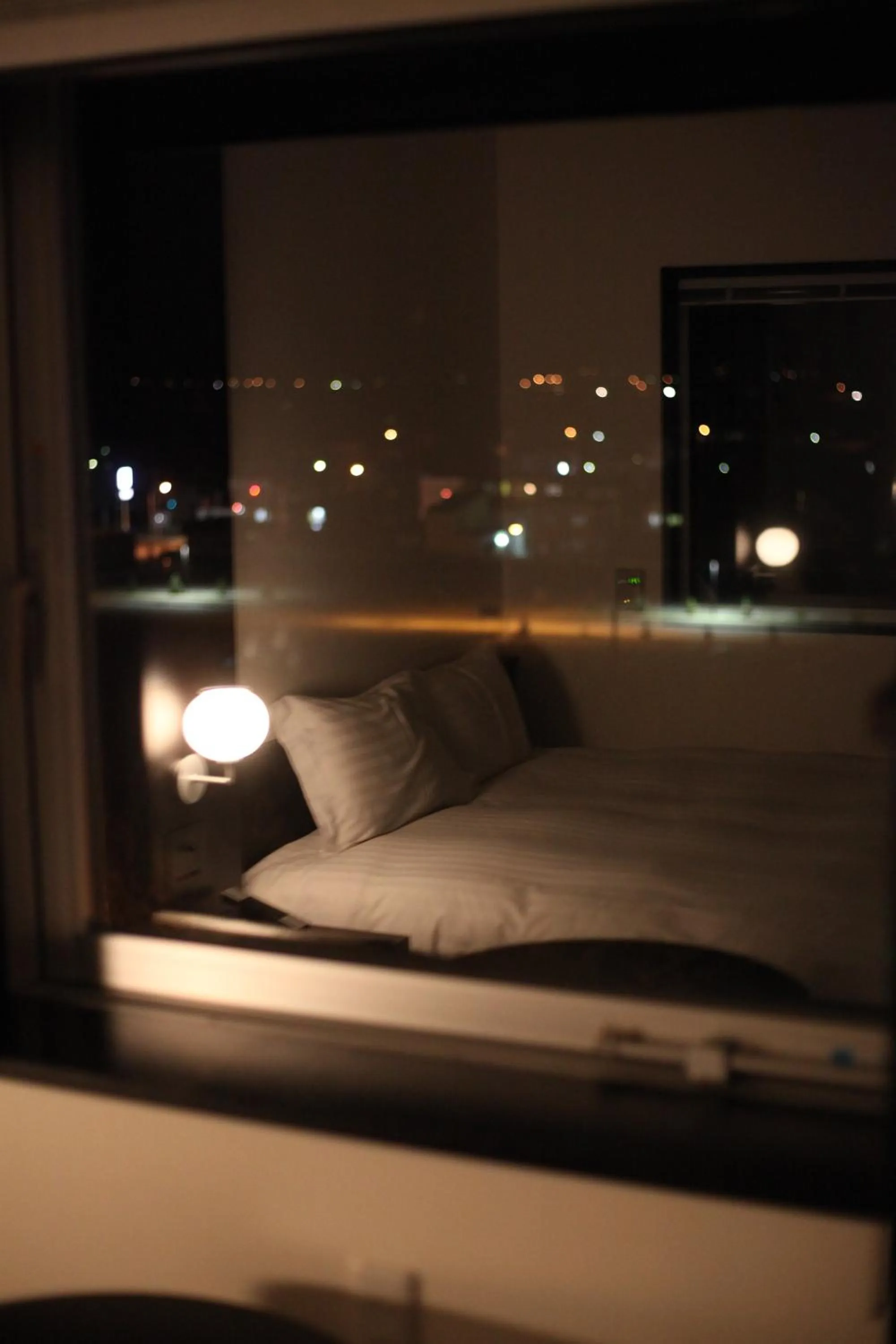 Bed in Furano Natulux Hotel