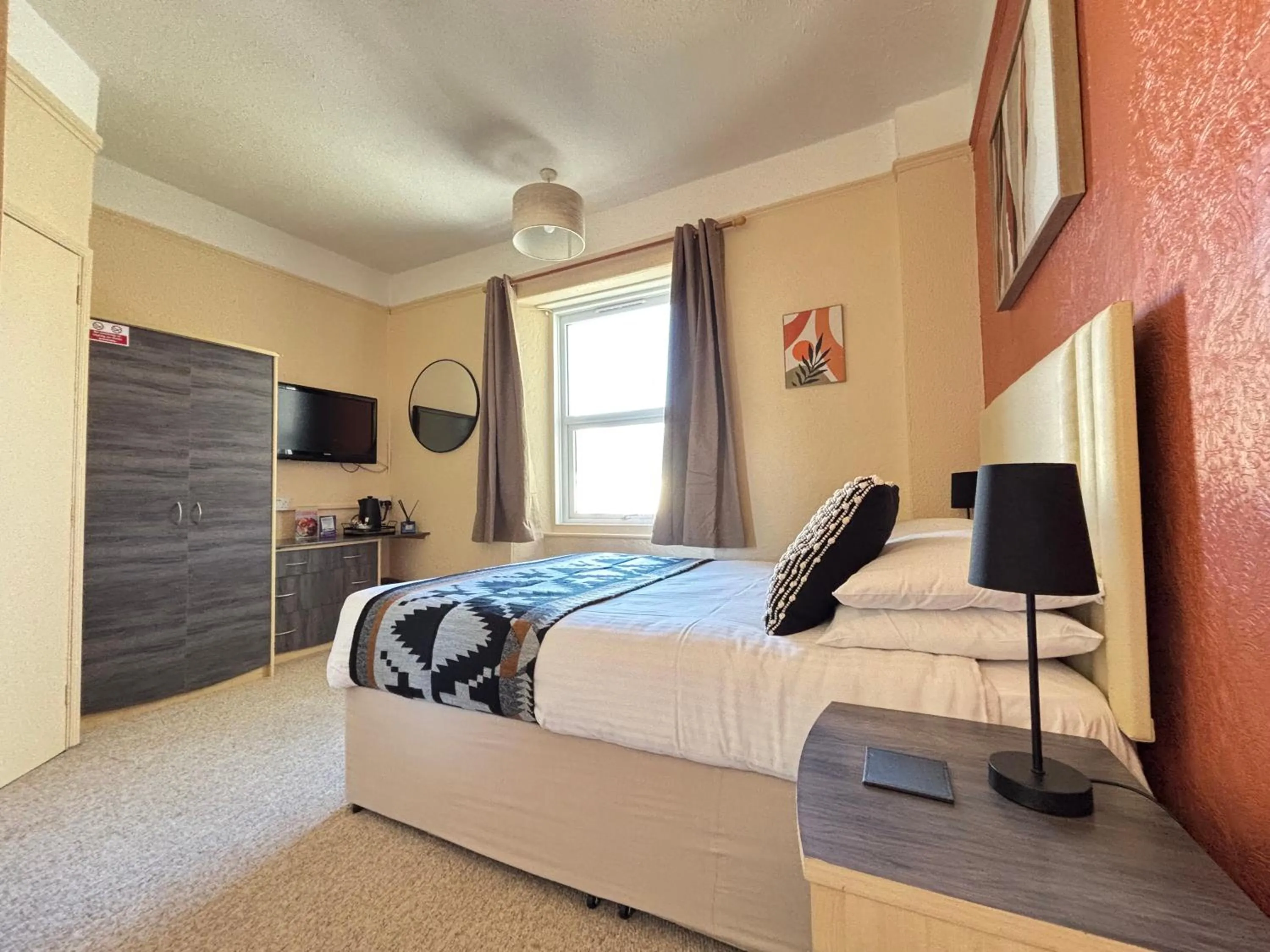 Bed in Three Palms Hotel