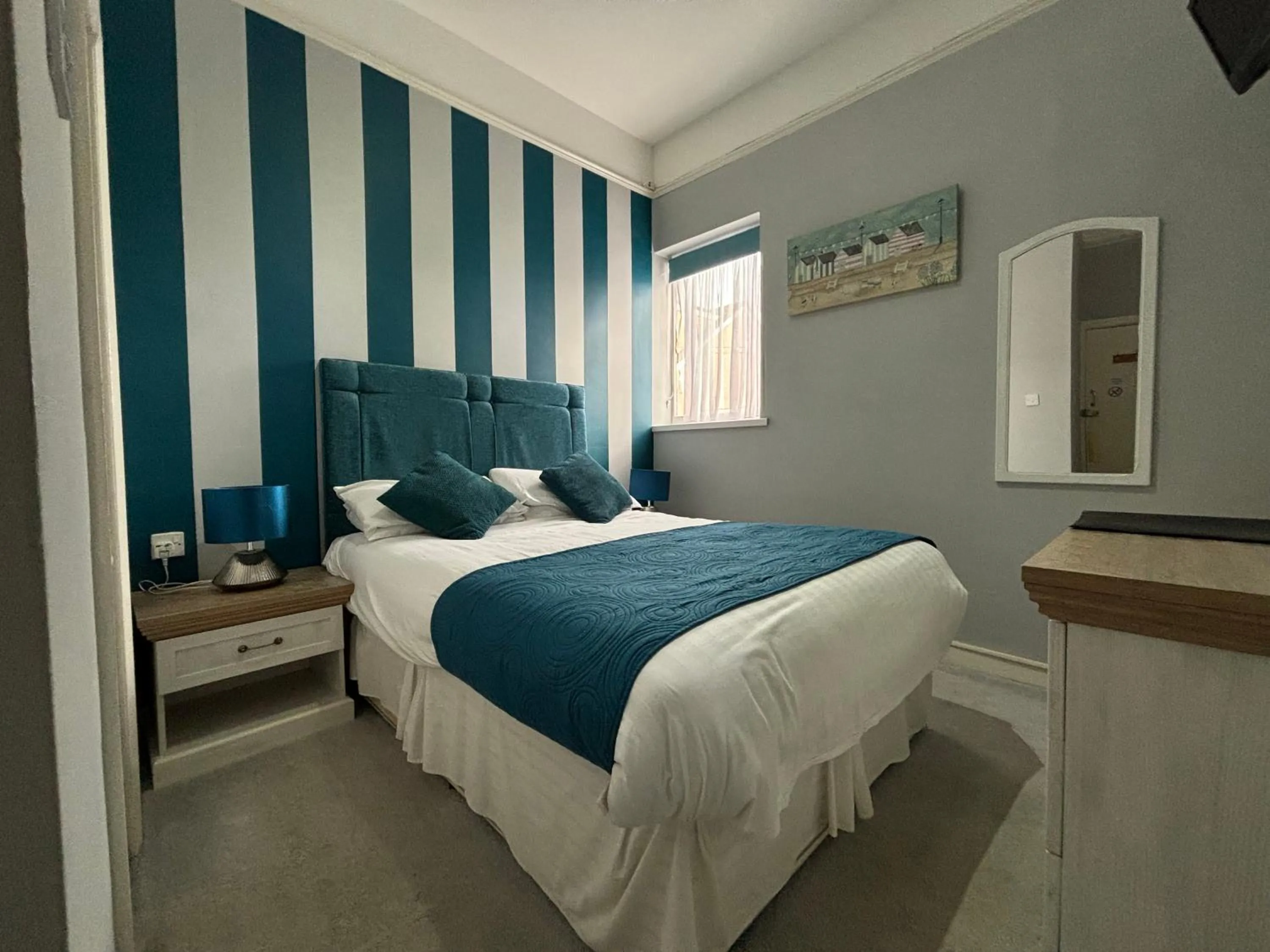 Bed in Three Palms Hotel