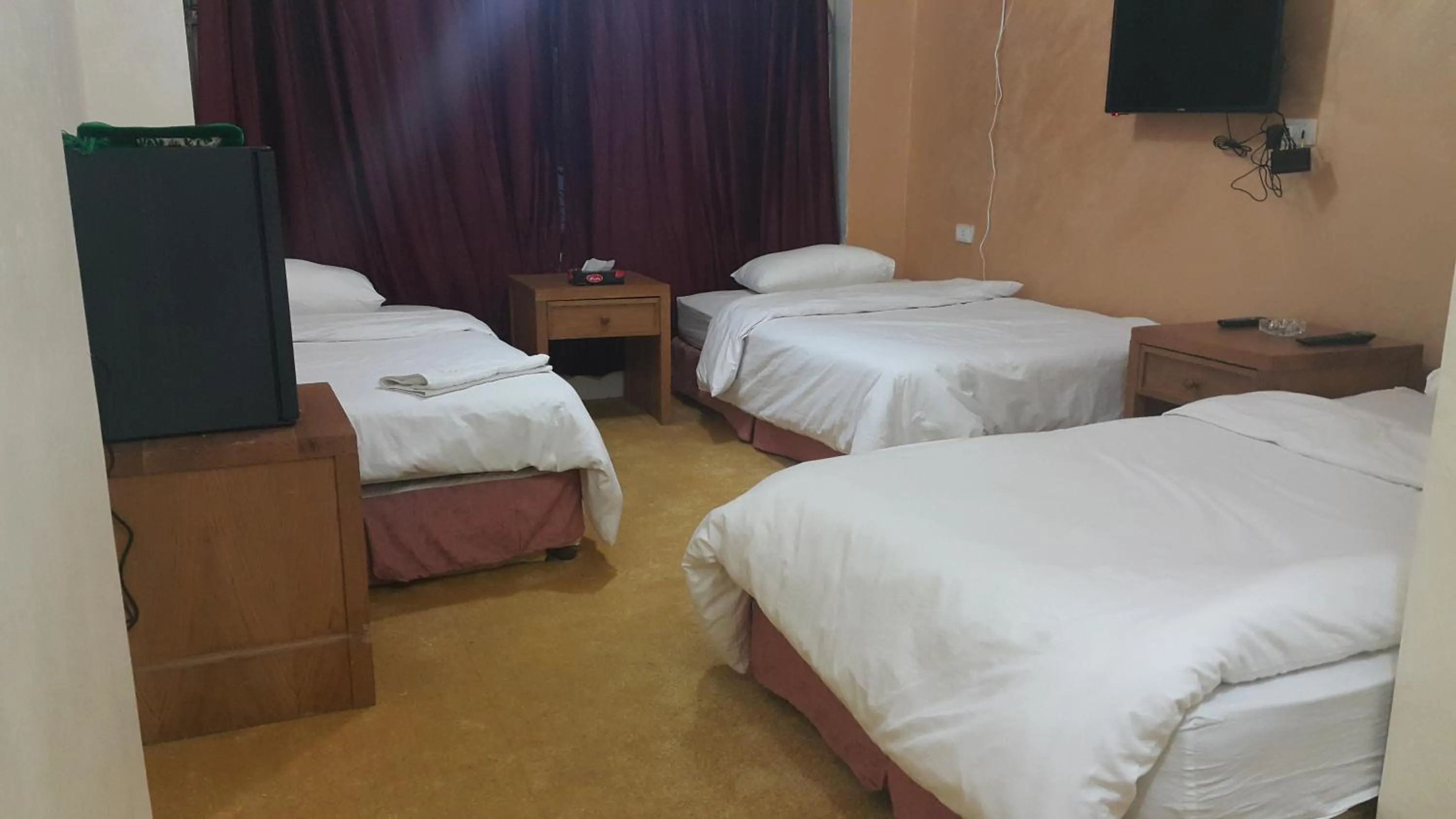 Bedroom in Al-Houriat Hotel