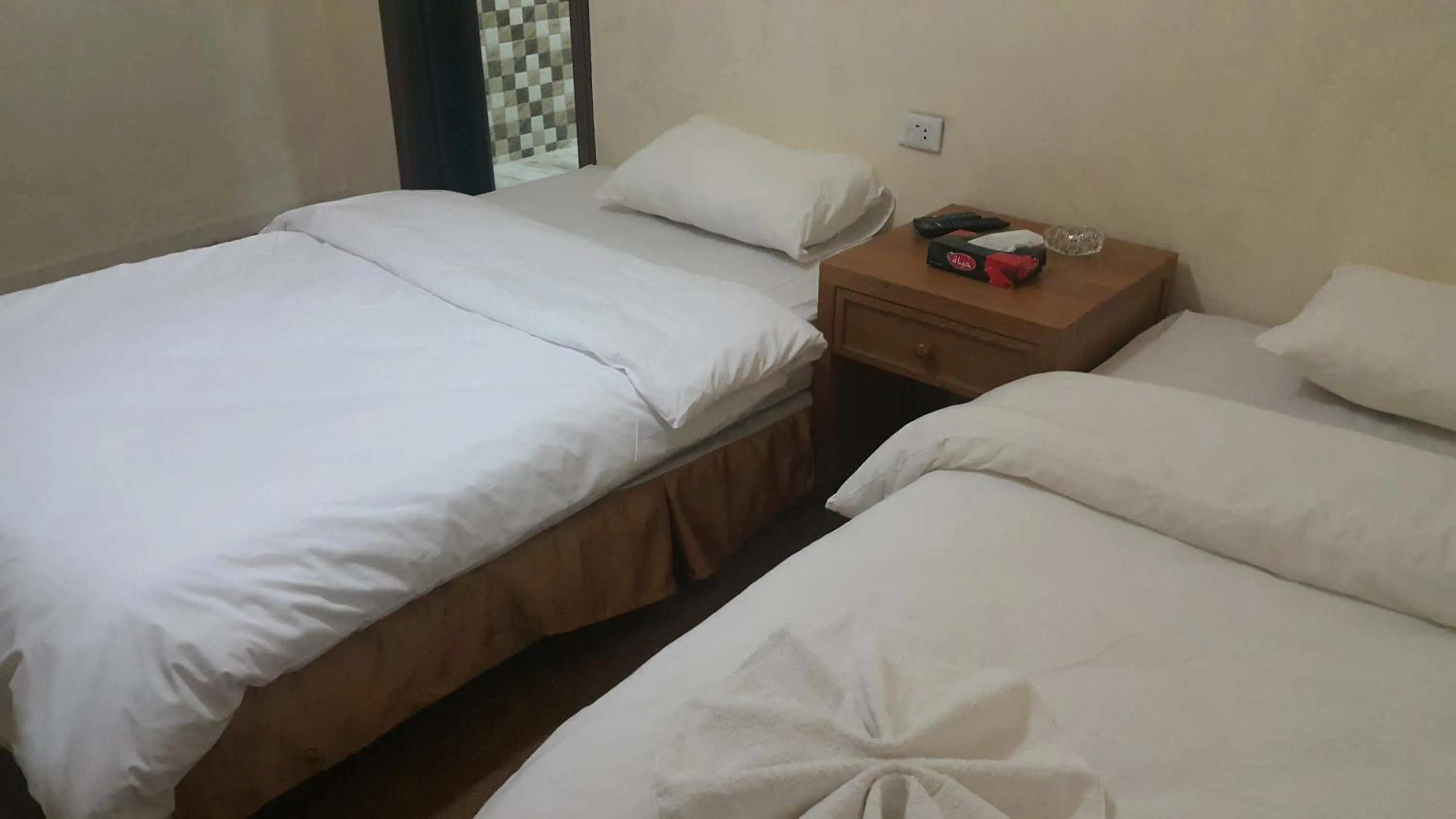 Bedroom in Al-Houriat Hotel