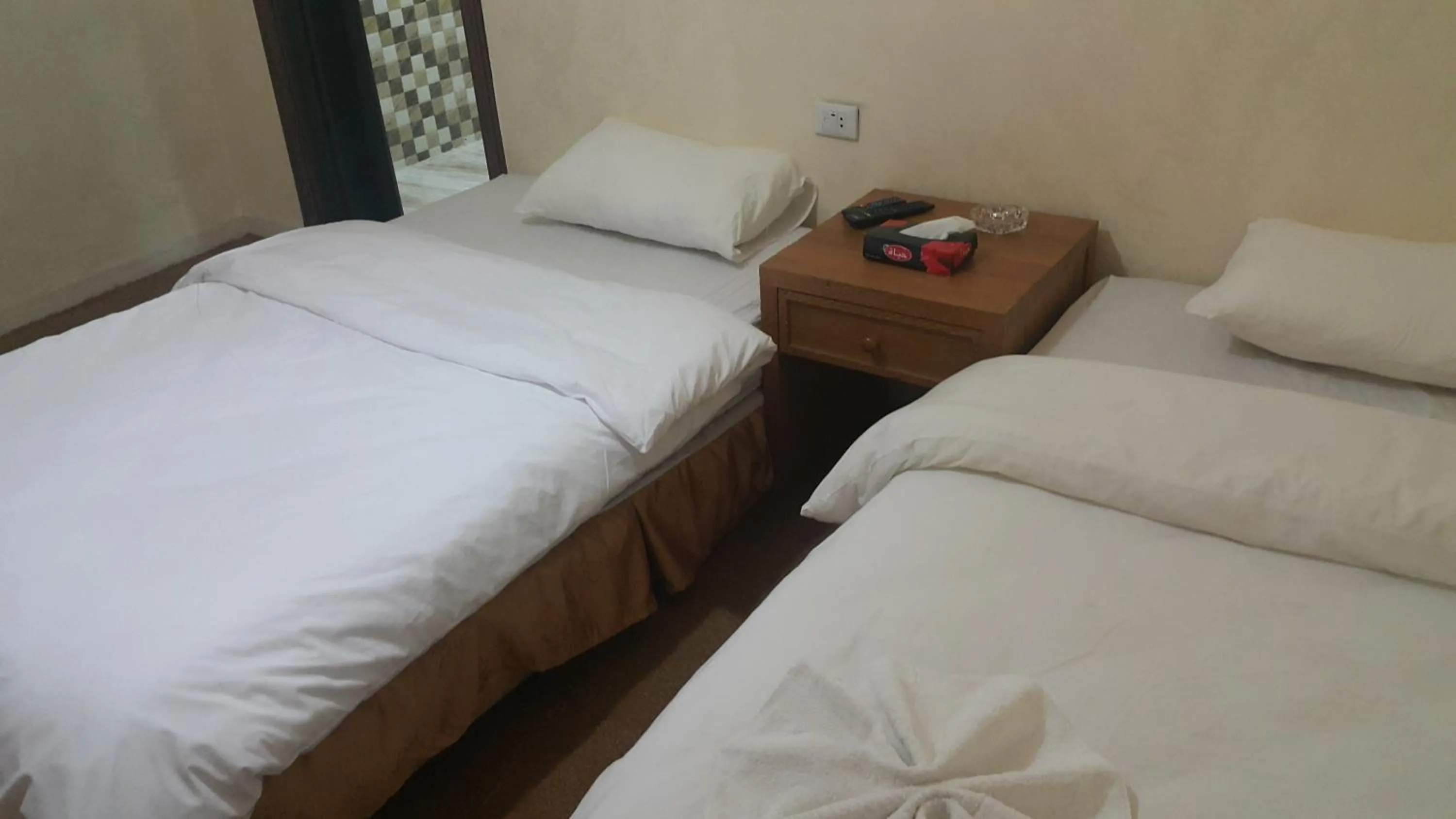 Bedroom in Al-Houriat Hotel