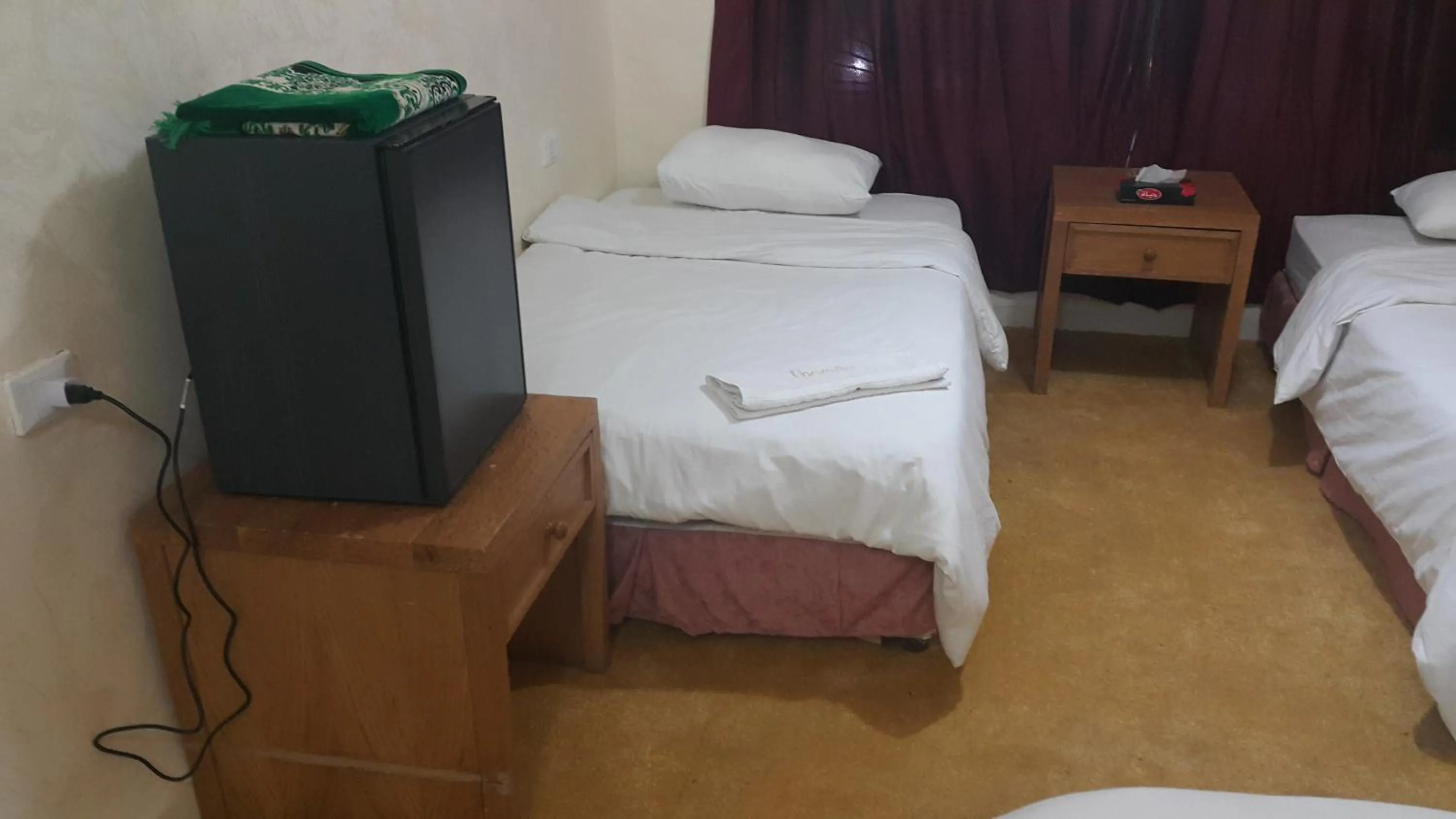 Bedroom in Al-Houriat Hotel