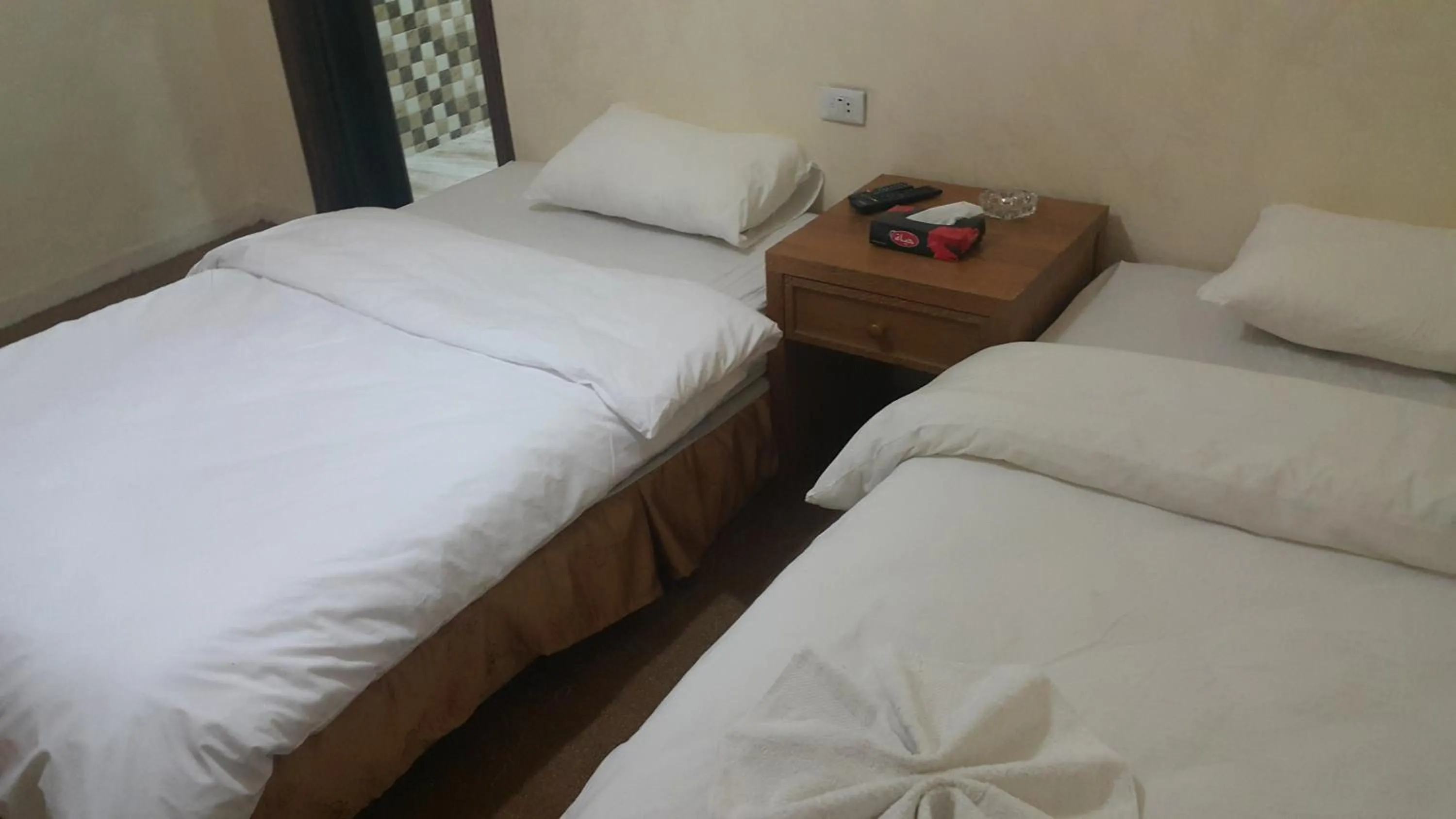 Bedroom in Al-Houriat Hotel