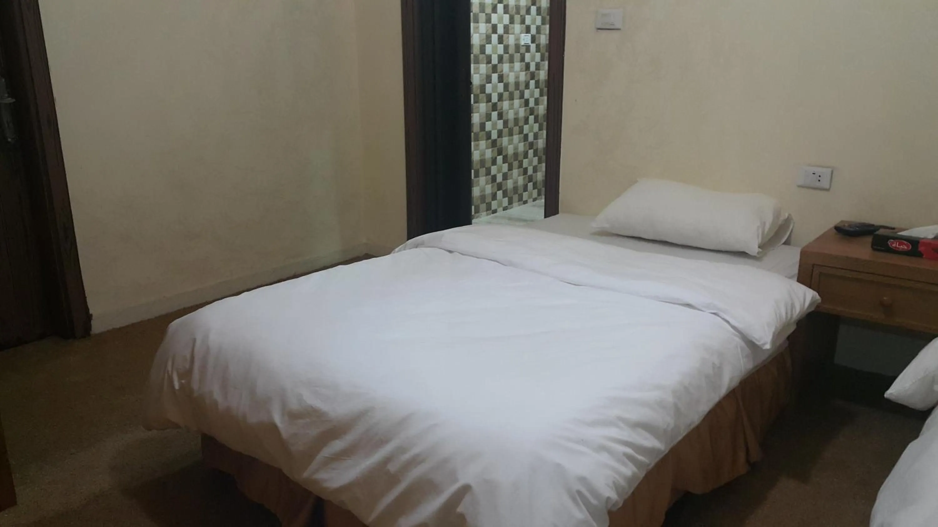 Bedroom in Al-Houriat Hotel