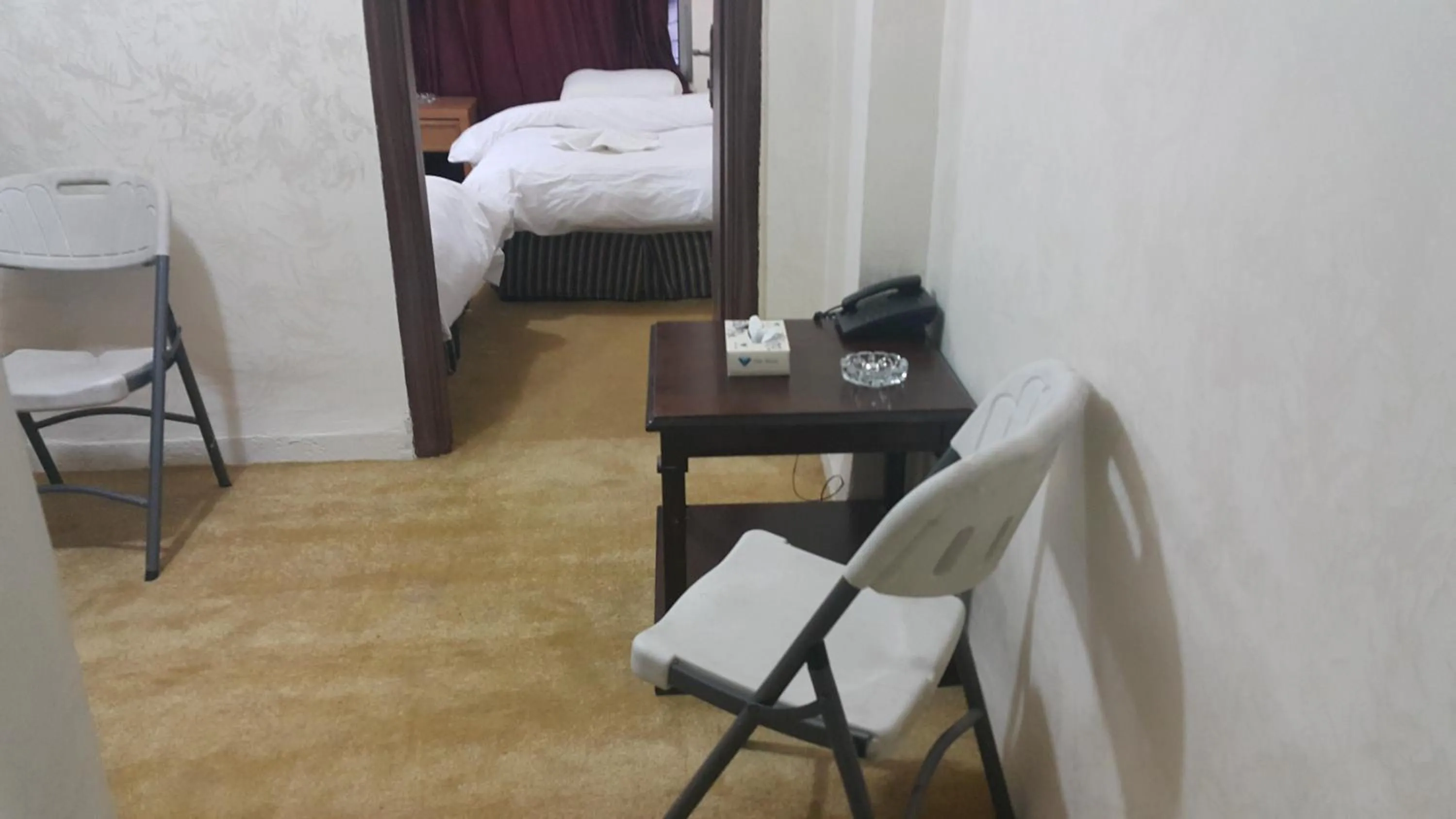 Bedroom in Al-Houriat Hotel