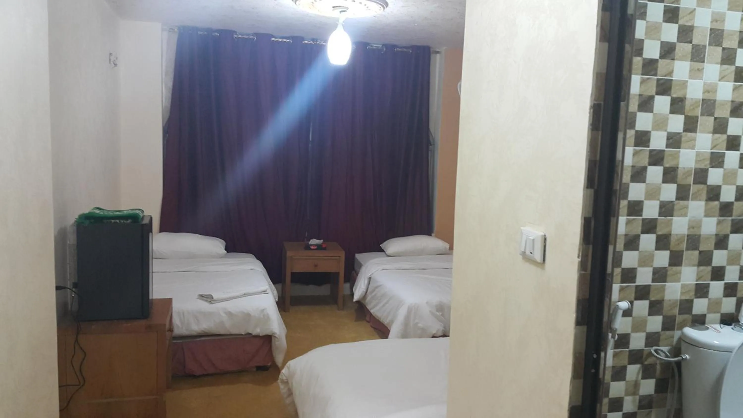 Bedroom in Al-Houriat Hotel