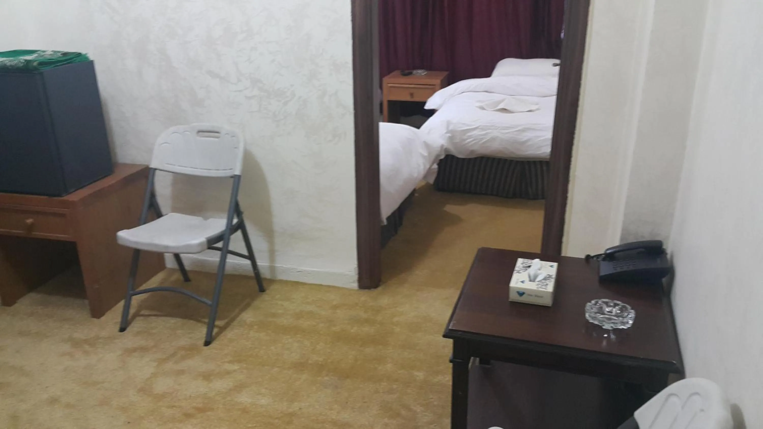 Living room in Al-Houriat Hotel