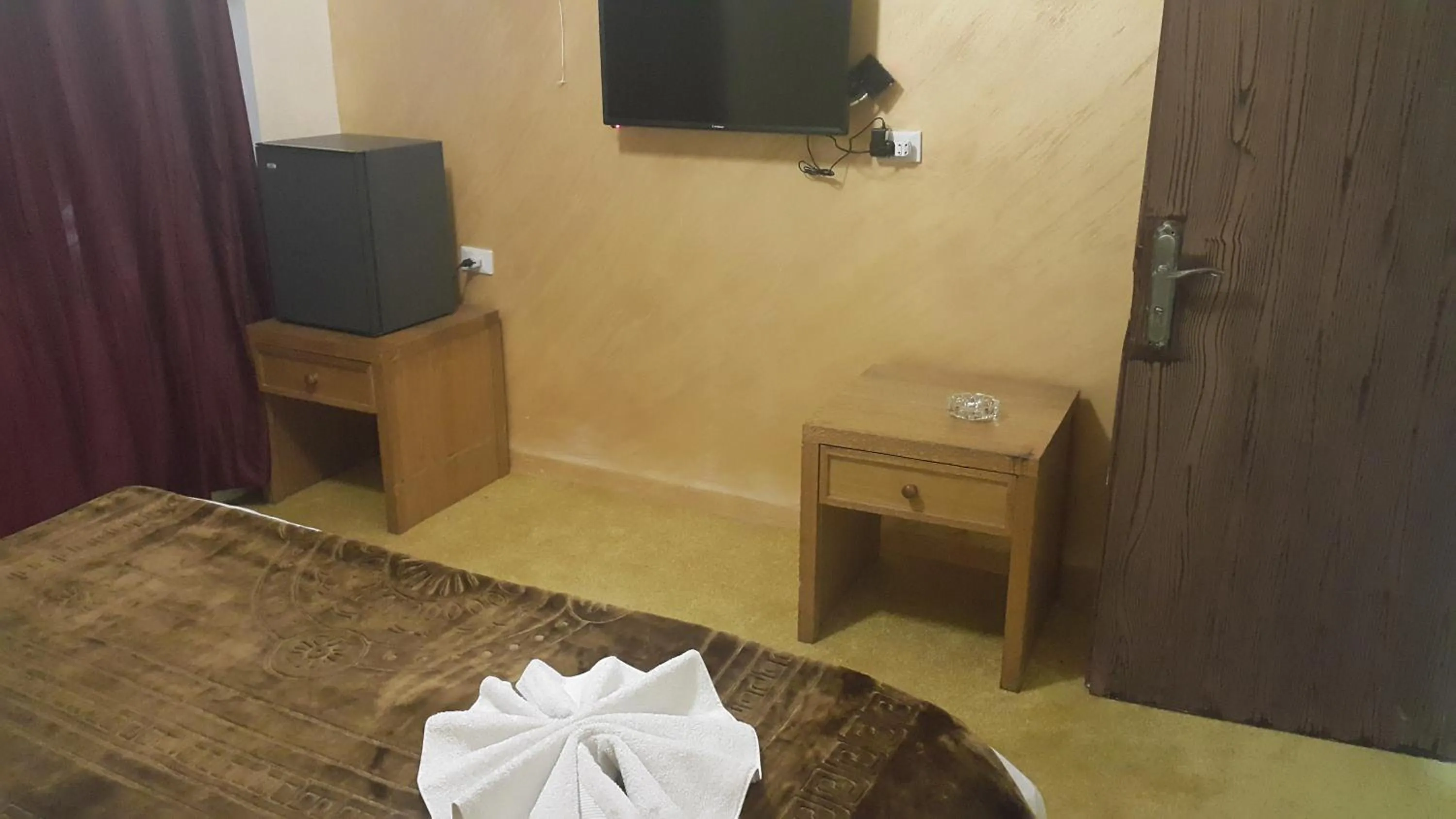 Bedroom in Al-Houriat Hotel