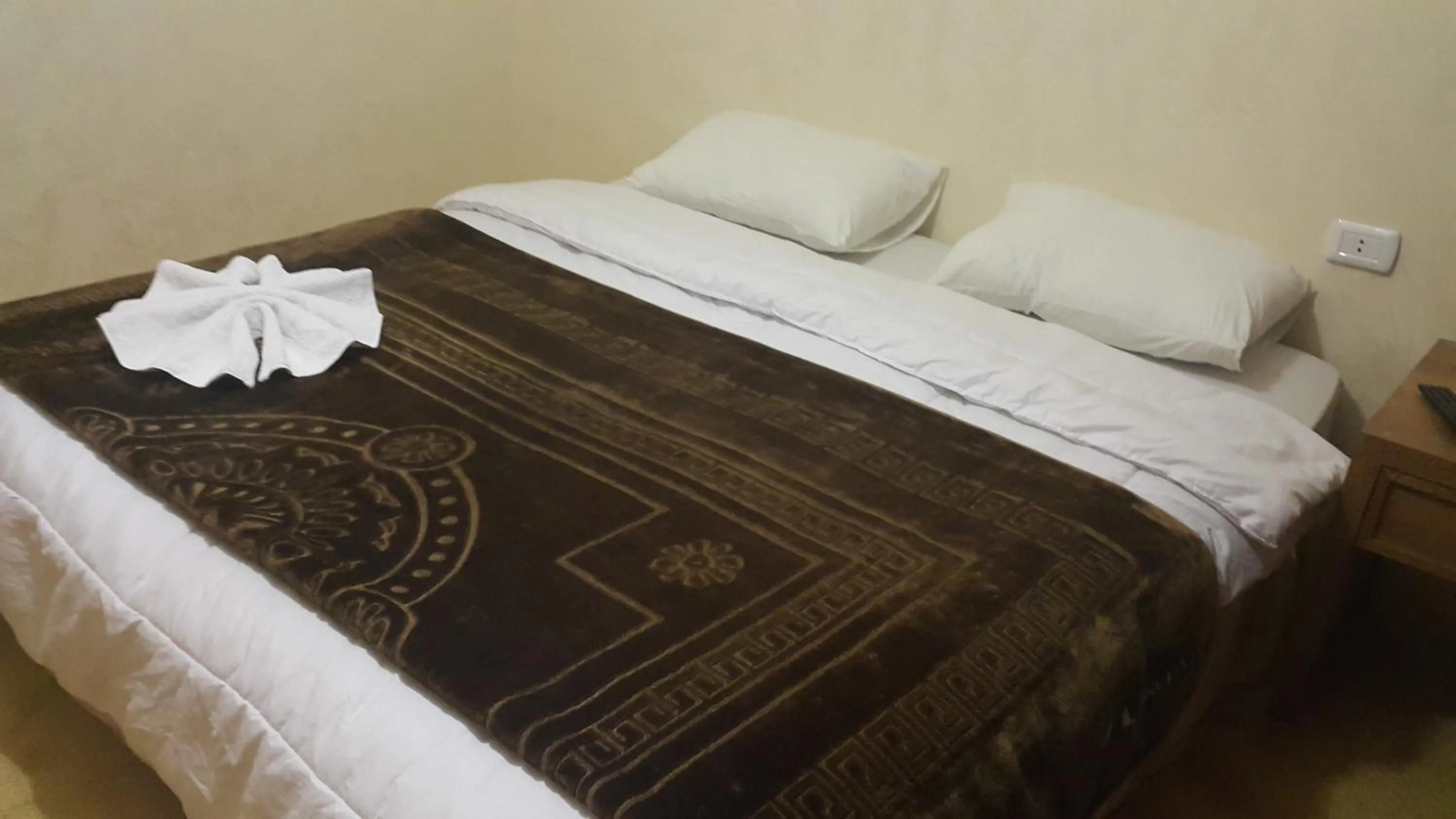 Bedroom in Al-Houriat Hotel