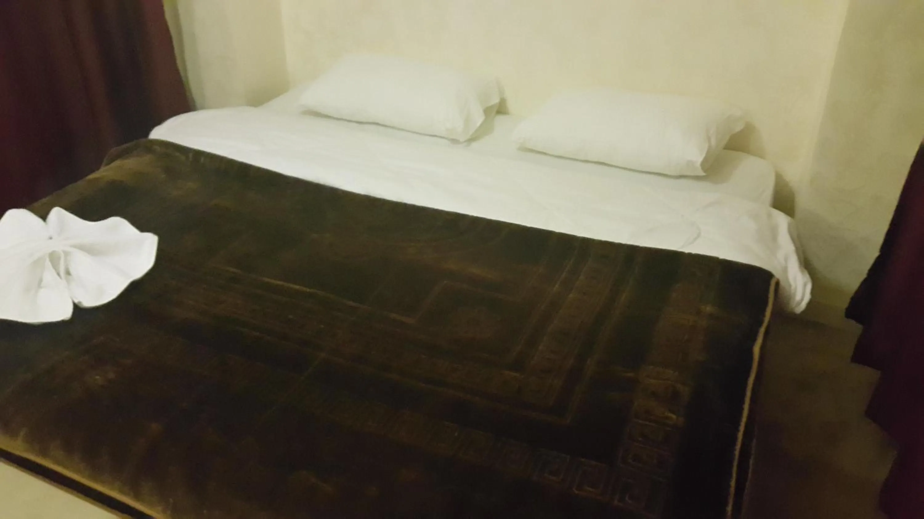 Bedroom in Al-Houriat Hotel